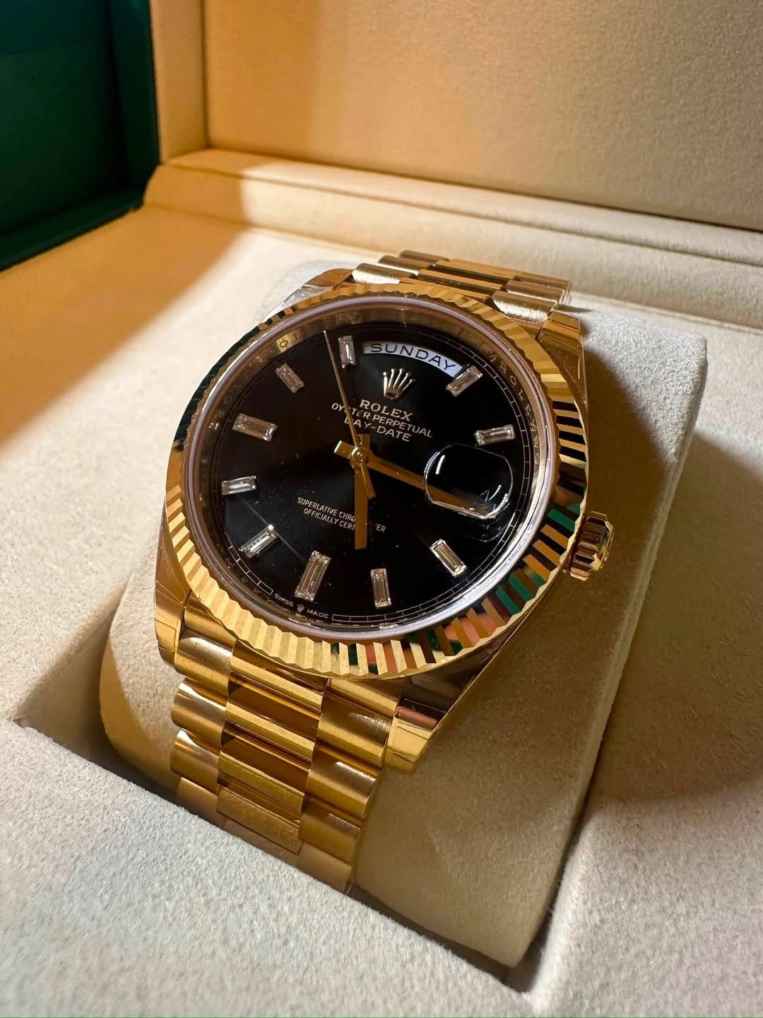 May be an image of wrist watch and text