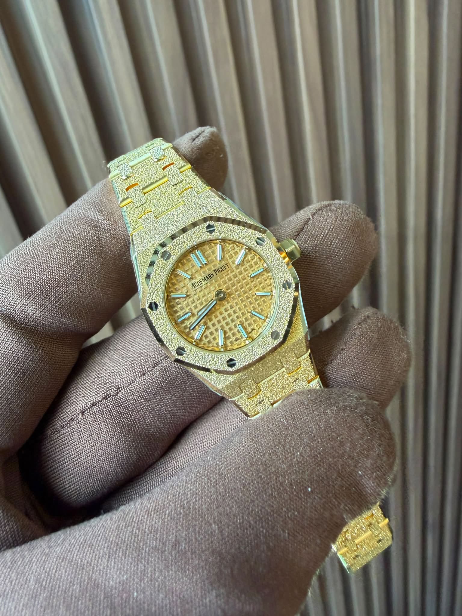 May be an image of wrist watch and text