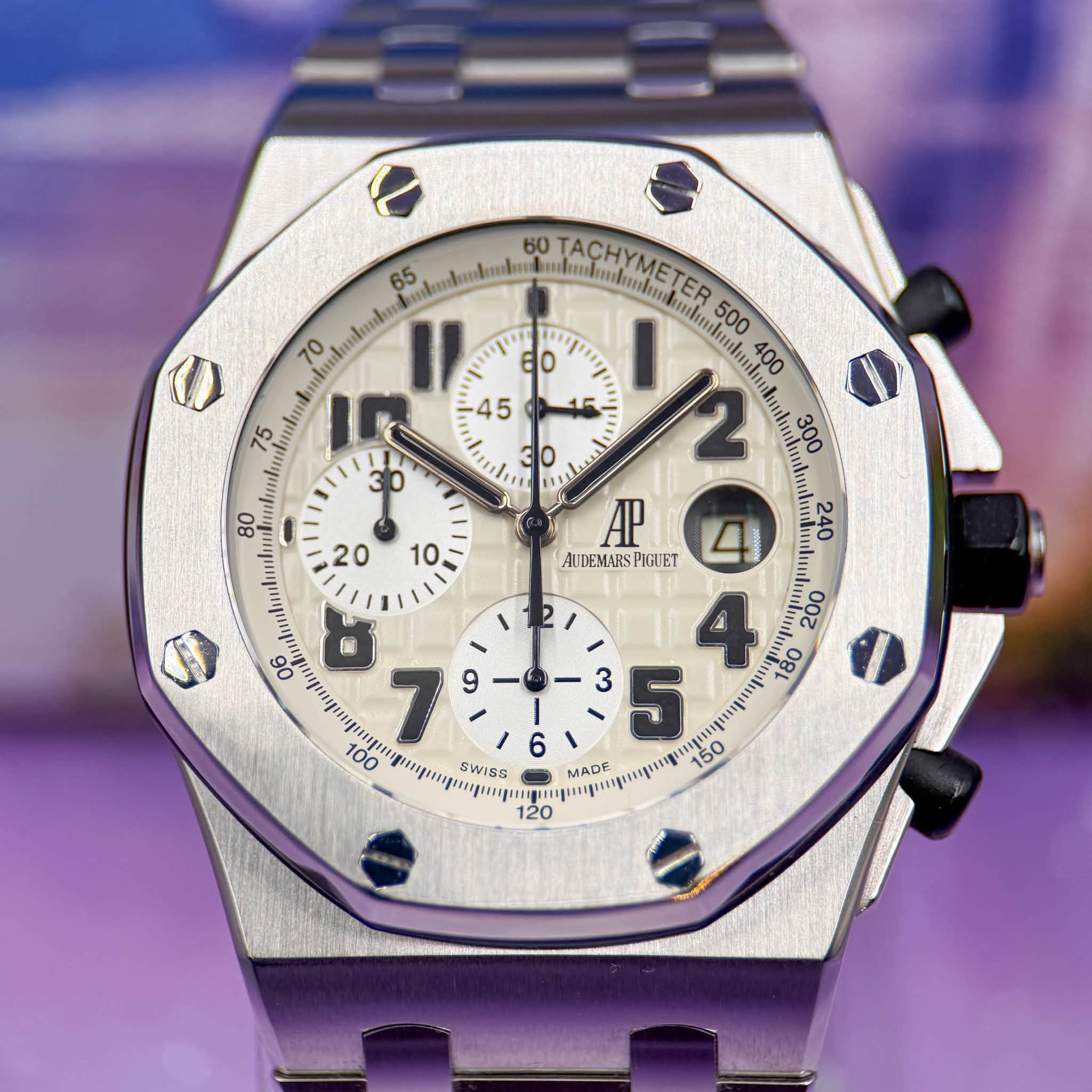 May be an image of wrist watch and text