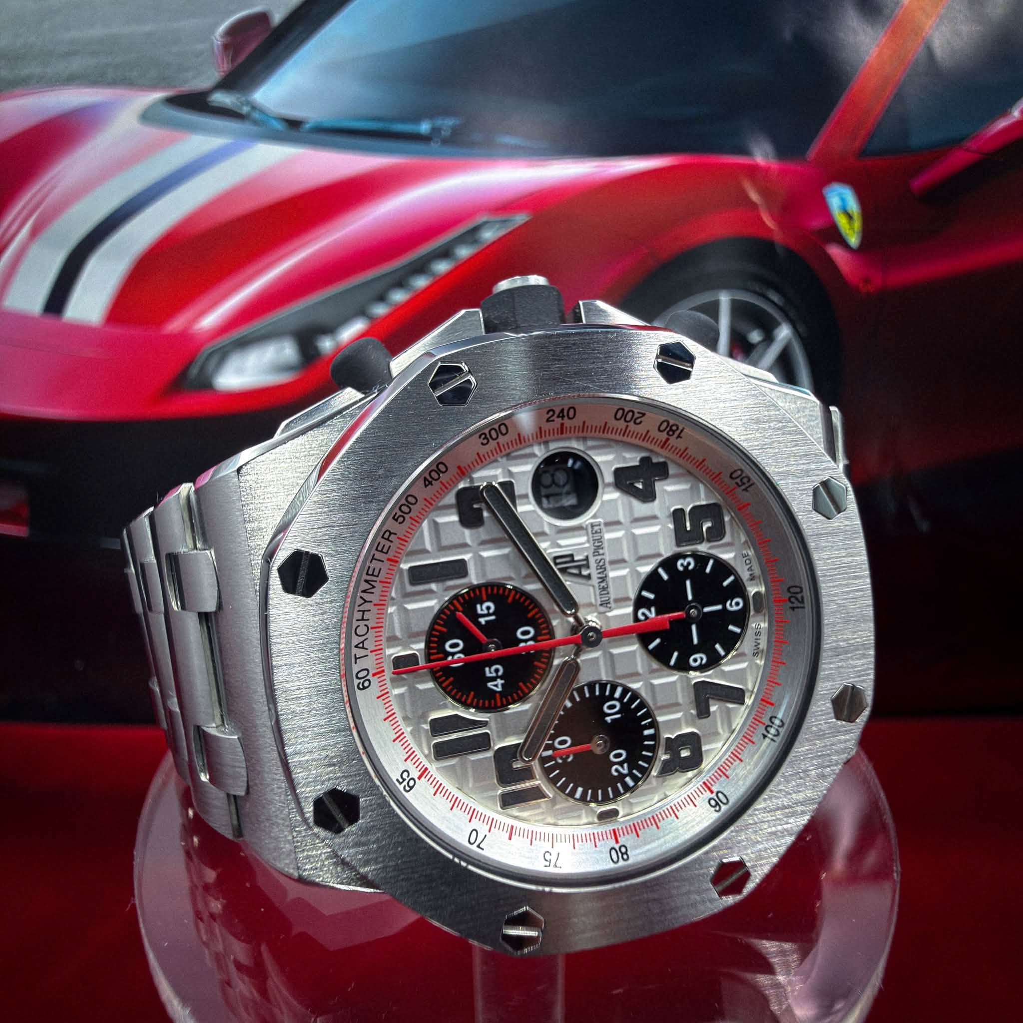 May be an image of wrist watch and text