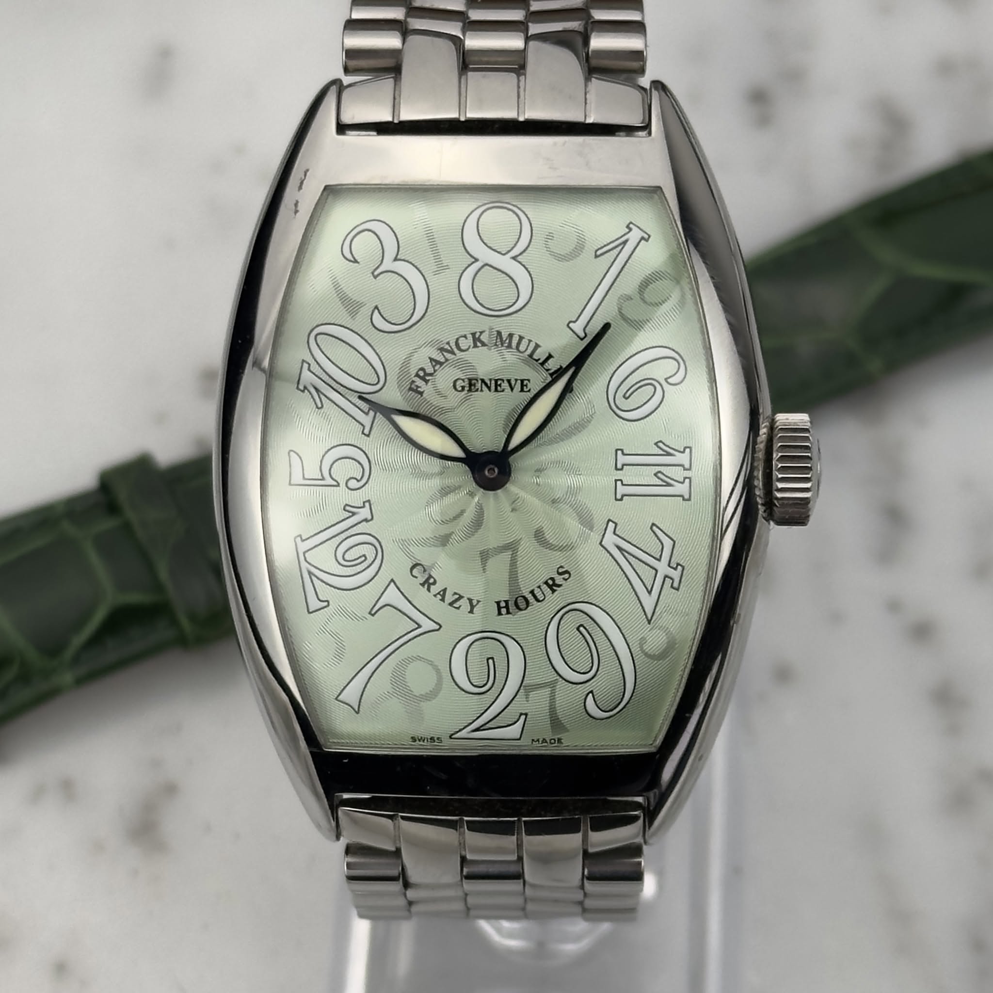 May be an image of ‎wrist watch and ‎text that says '‎3 อ MUL 65/03 38 Aanspn 8 NCKMULL قمد 19 ብ C GENEVE ดล 6.510 10 II 129 URS + CRAZY‎'‎‎
