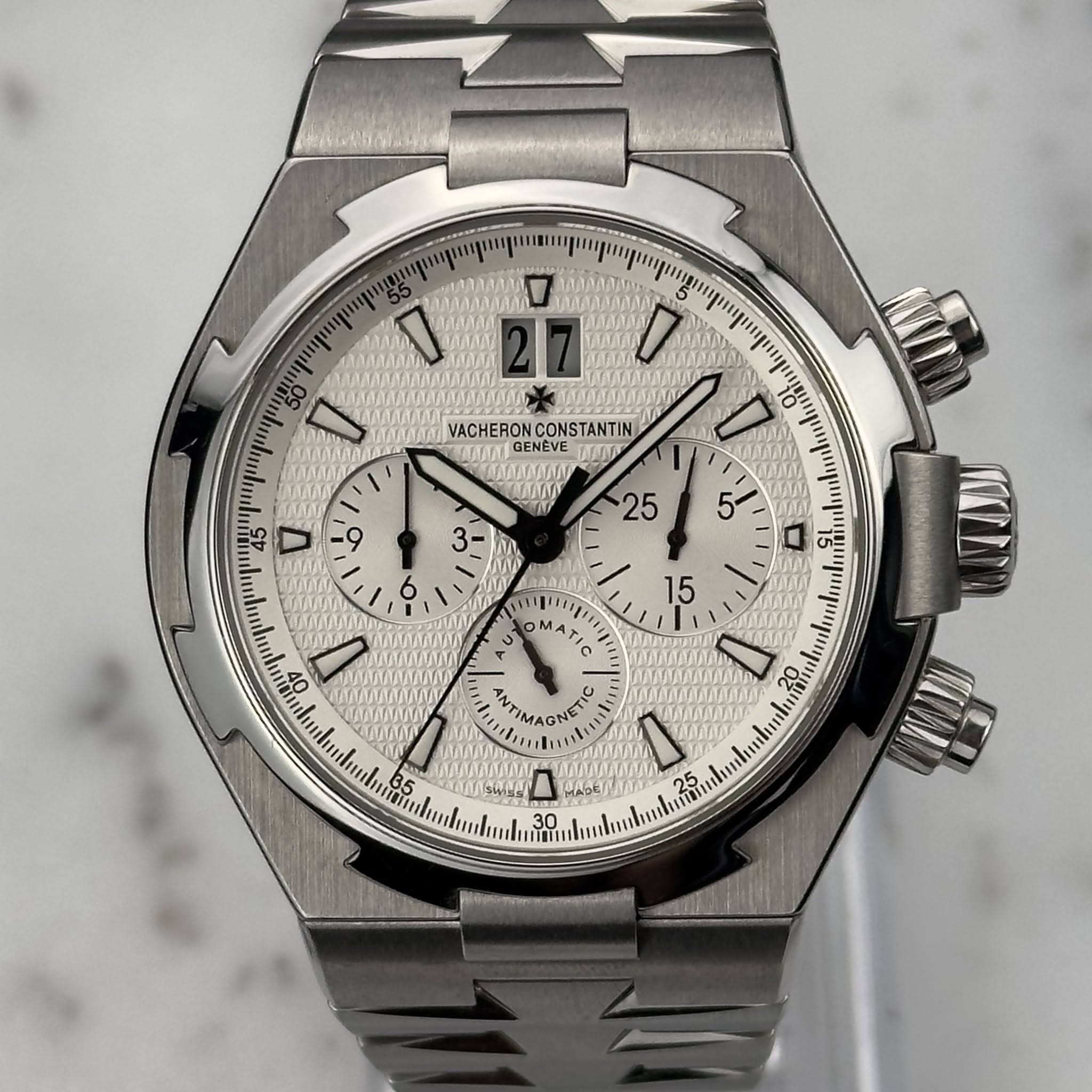 May be an image of wrist watch and text