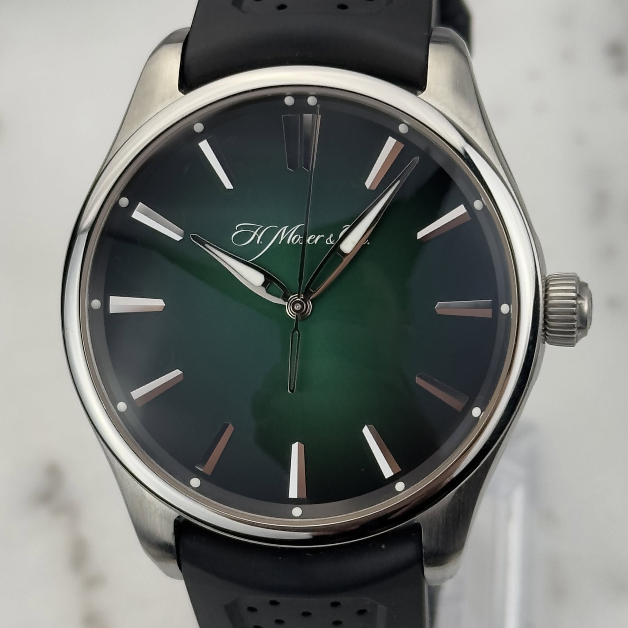 May be an image of wrist watch and text