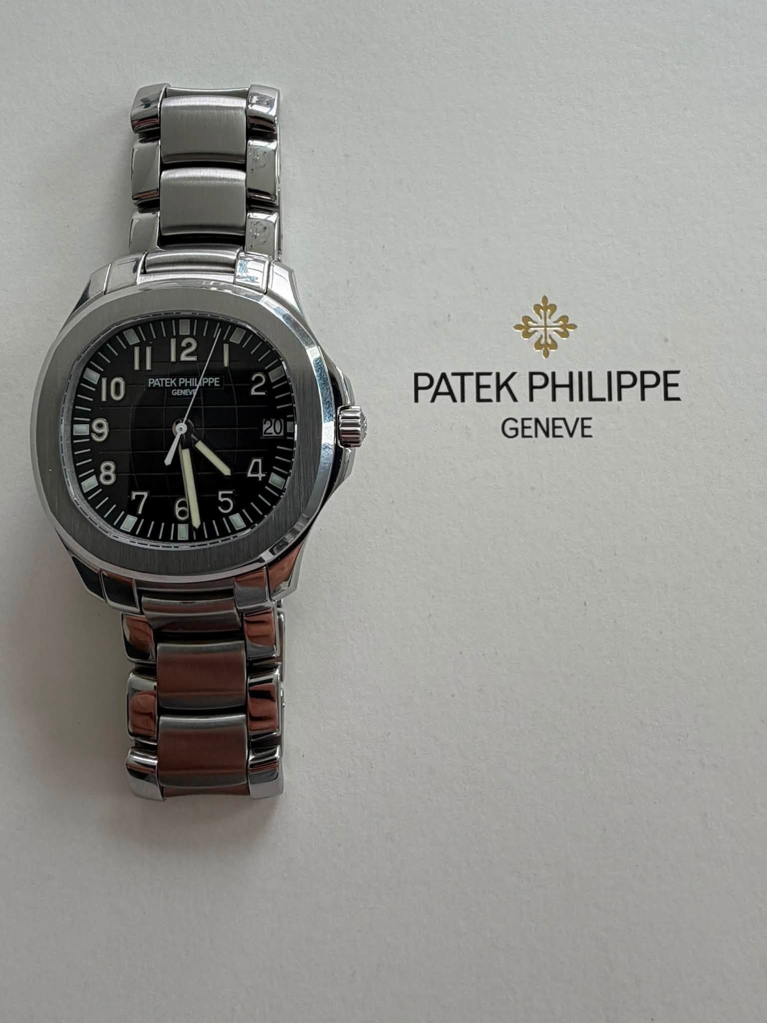 May be an image of wrist watch and text that says '1|12 II 12 10 E9 8 7 来 PATEKPHILIPPE PATEK PHILIPPE GENEVE 5 6'