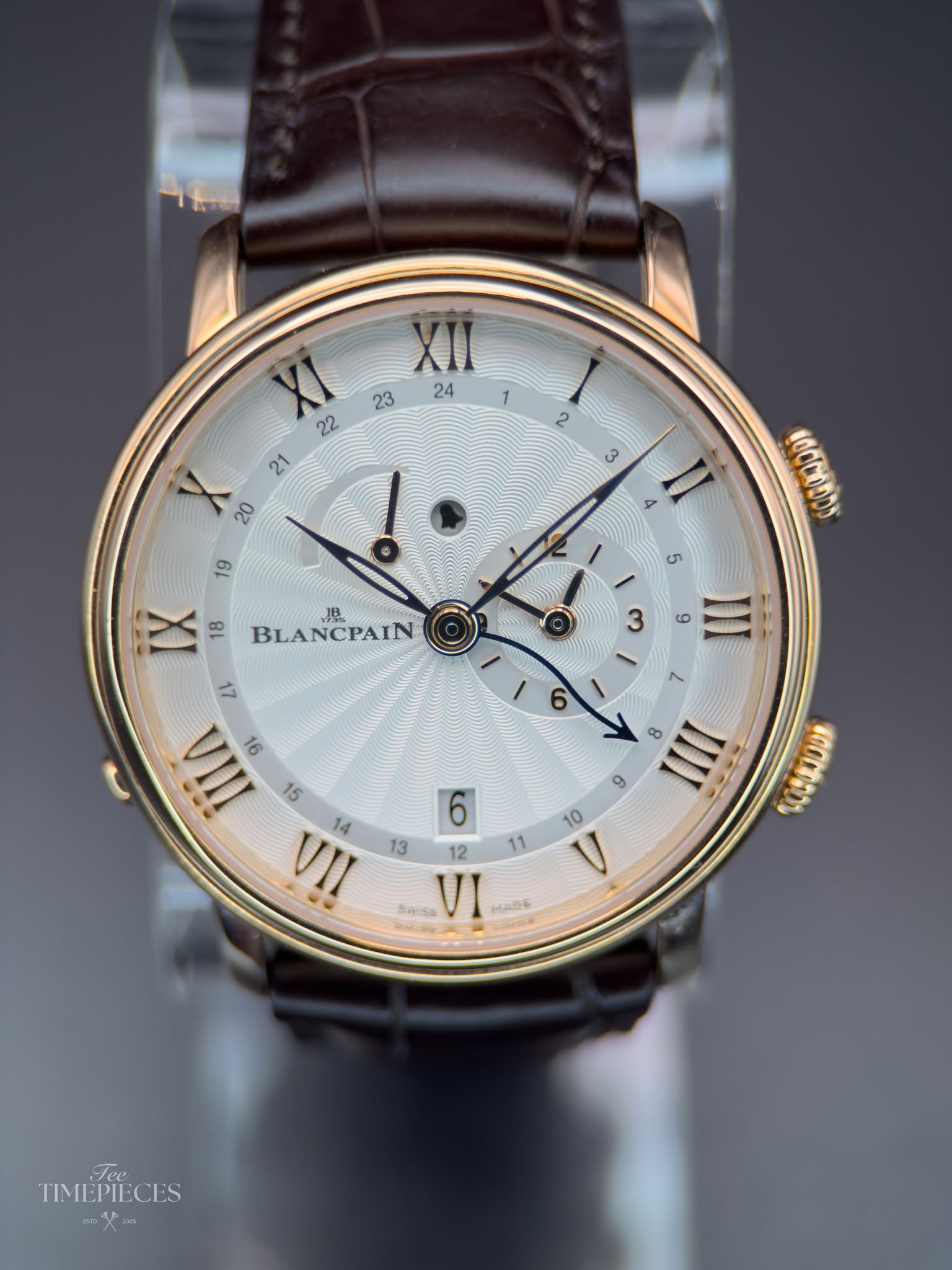 May be an image of wrist watch and text