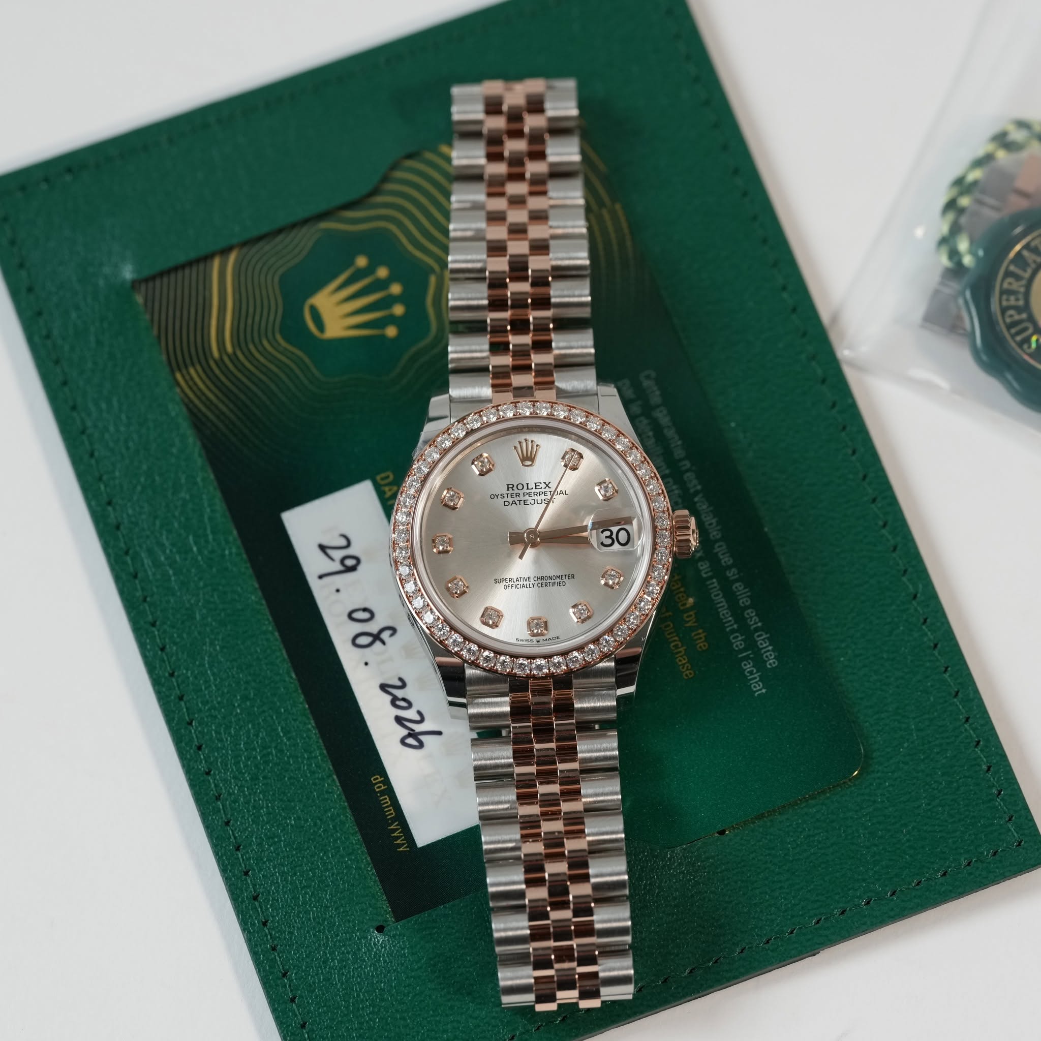May be an image of wrist watch and text