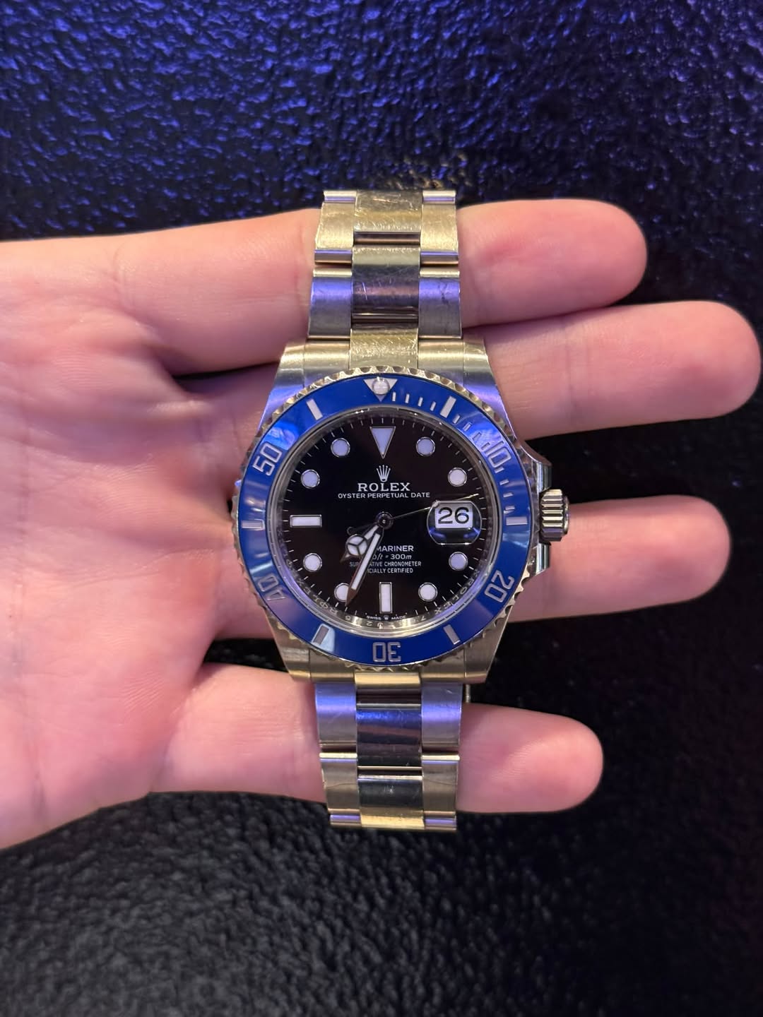 May be an image of wrist watch and text