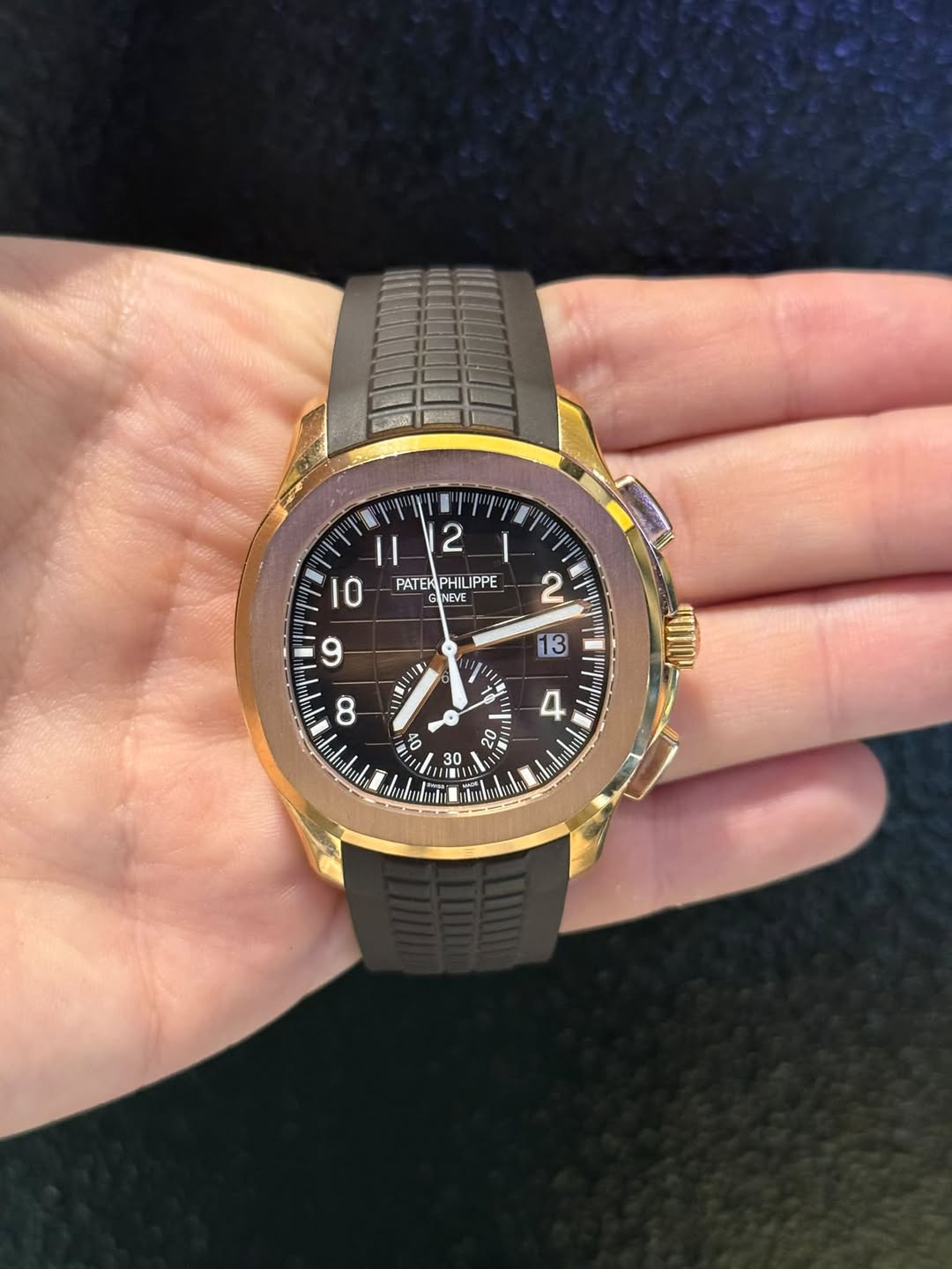 May be an image of wrist watch and text