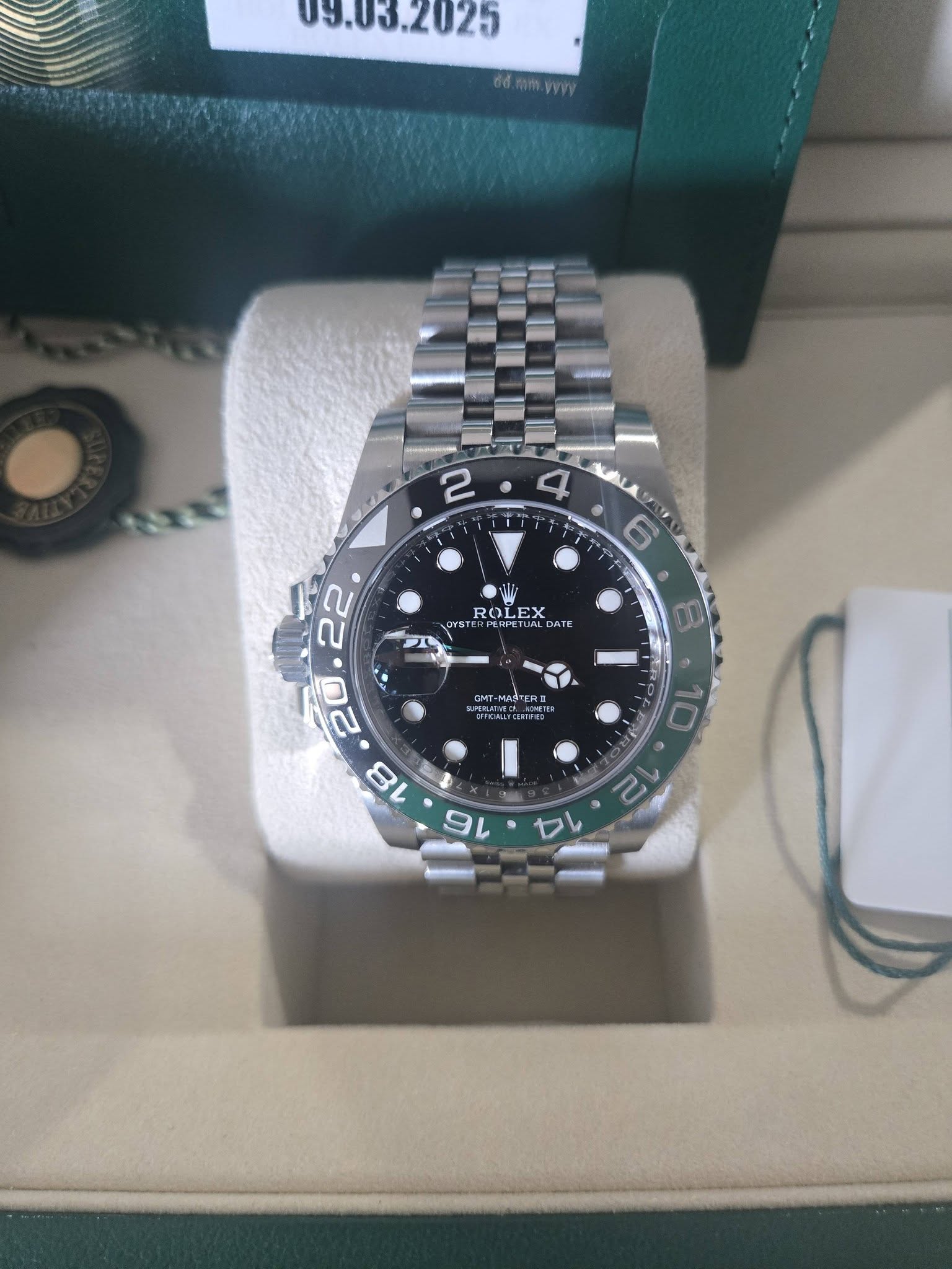 May be an image of wrist watch and text