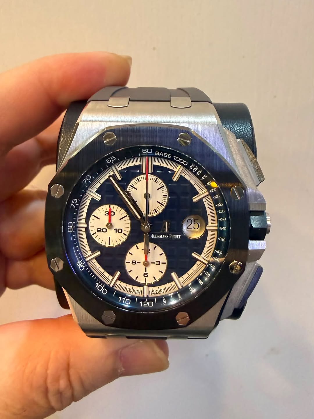 May be an image of wrist watch and text