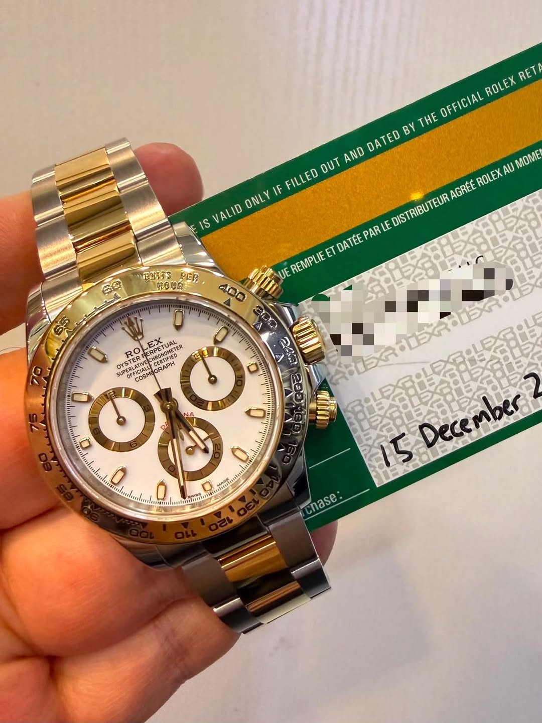 May be an image of wrist watch and text