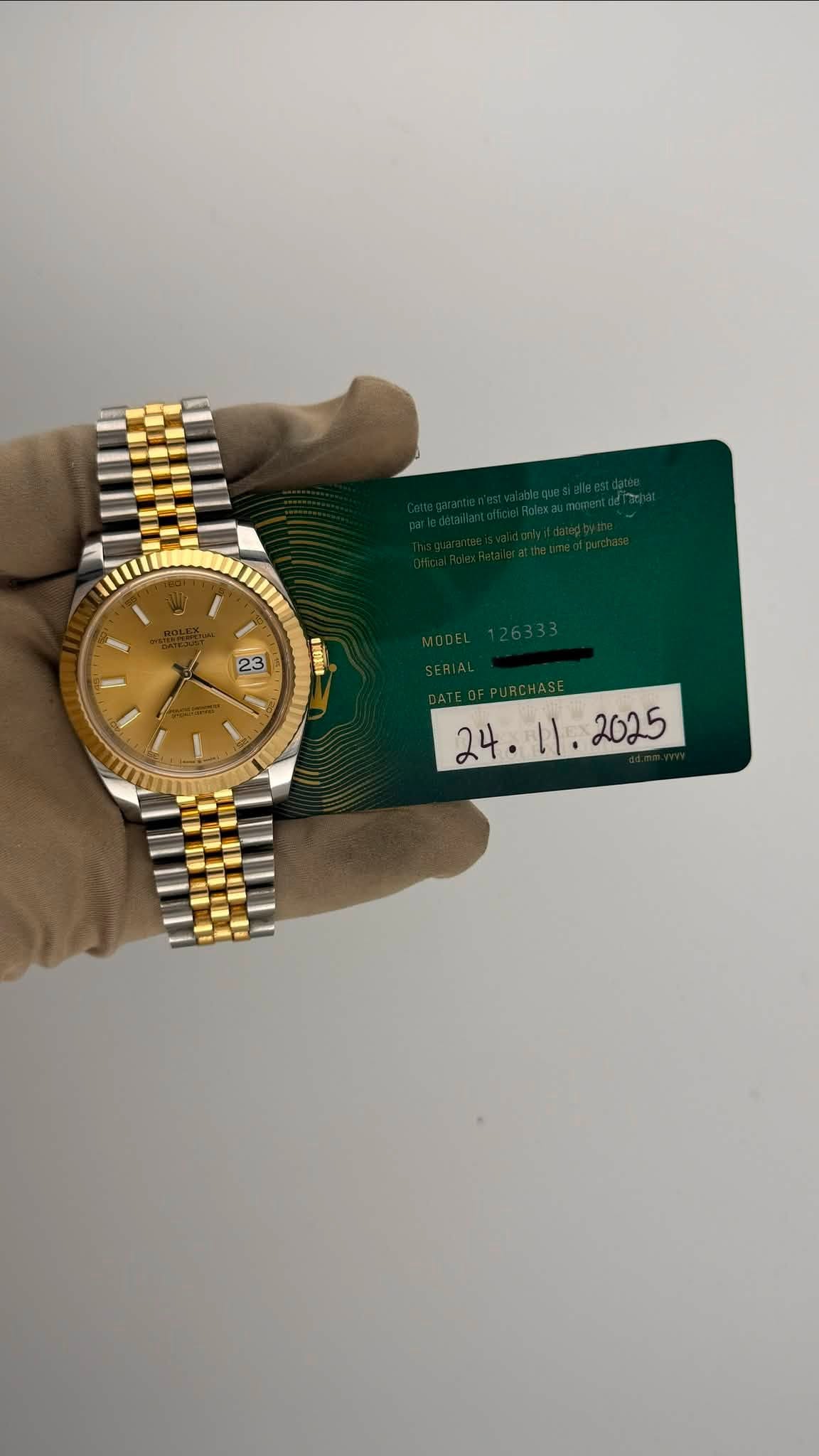 May be an image of wrist watch and text