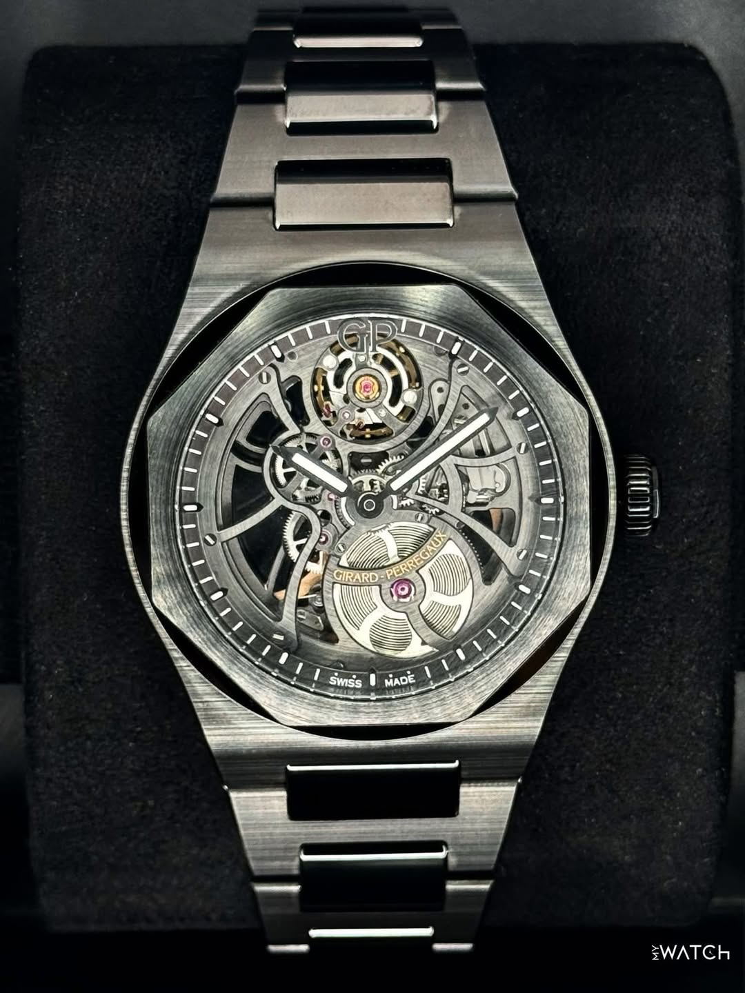 May be an image of wrist watch and text that says '0 و 1 مشفففر LE TT AUX GIRARD 0 รพาร์ร MADE WATCH'