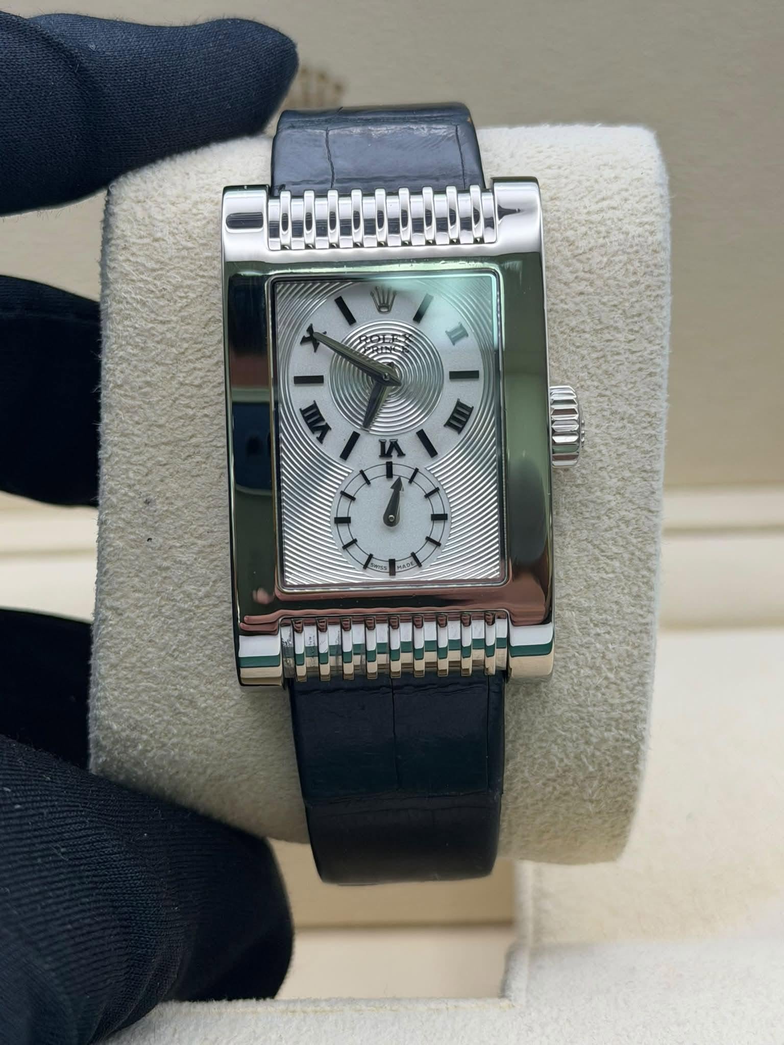 May be an image of wrist watch and text