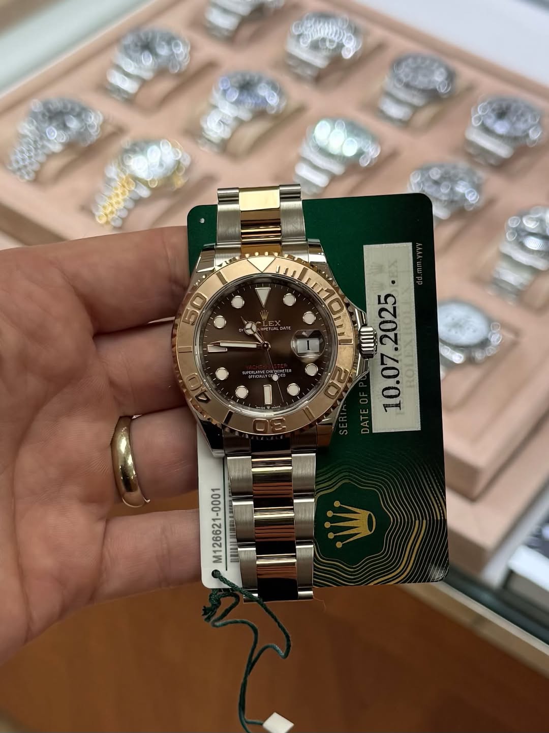 May be an image of wrist watch and text
