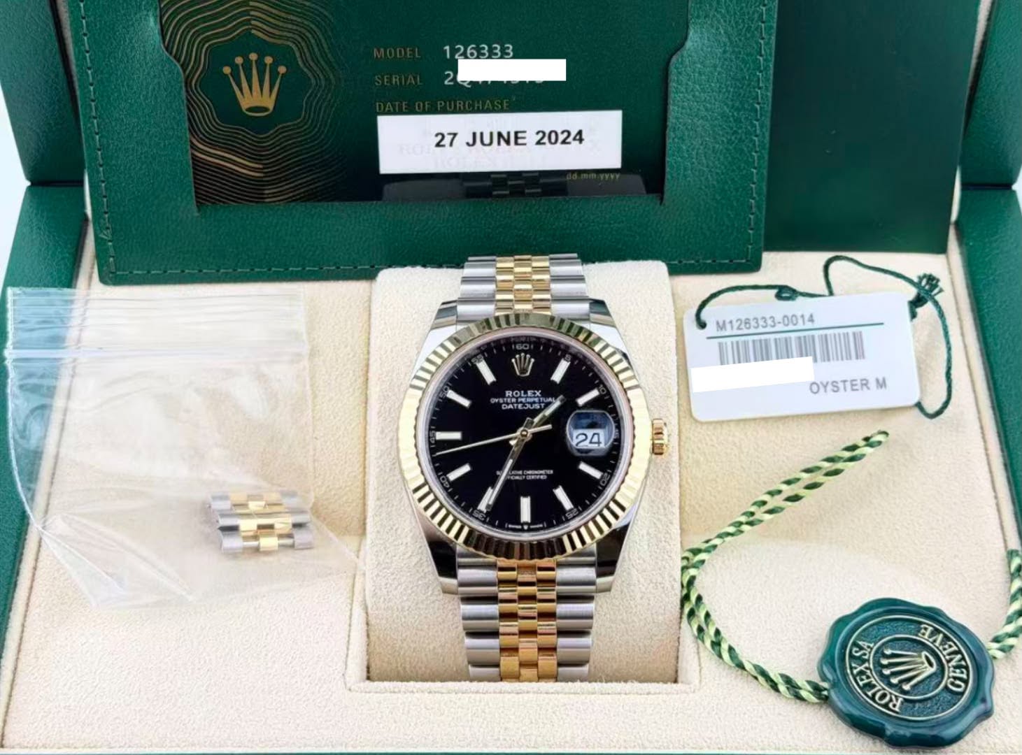 May be an image of wrist watch and text that says ' JUNE 27JUNE2024 2024 M126333-0014 ROLEX 界てた 24 OYSTER OYSTERM M L ចេា SXaTOR SA 7ป ា HЛRлHR EAFI'