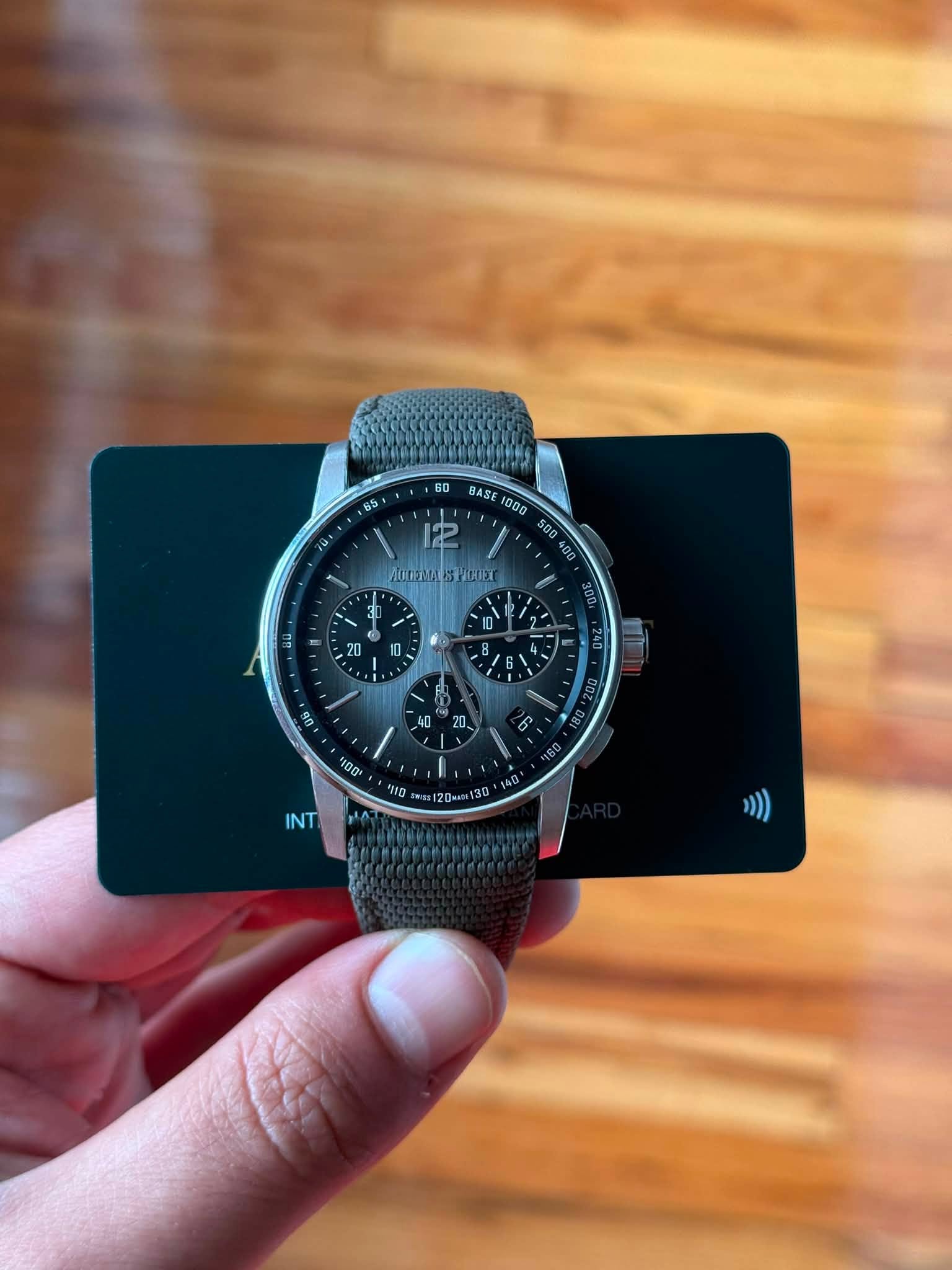 May be an image of wrist watch and text