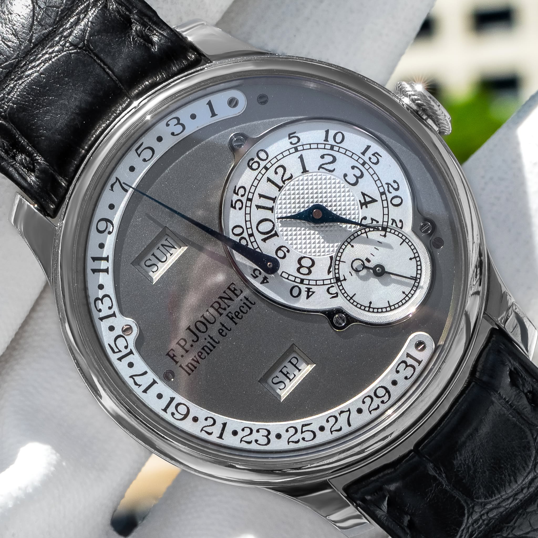 May be an image of wrist watch and text