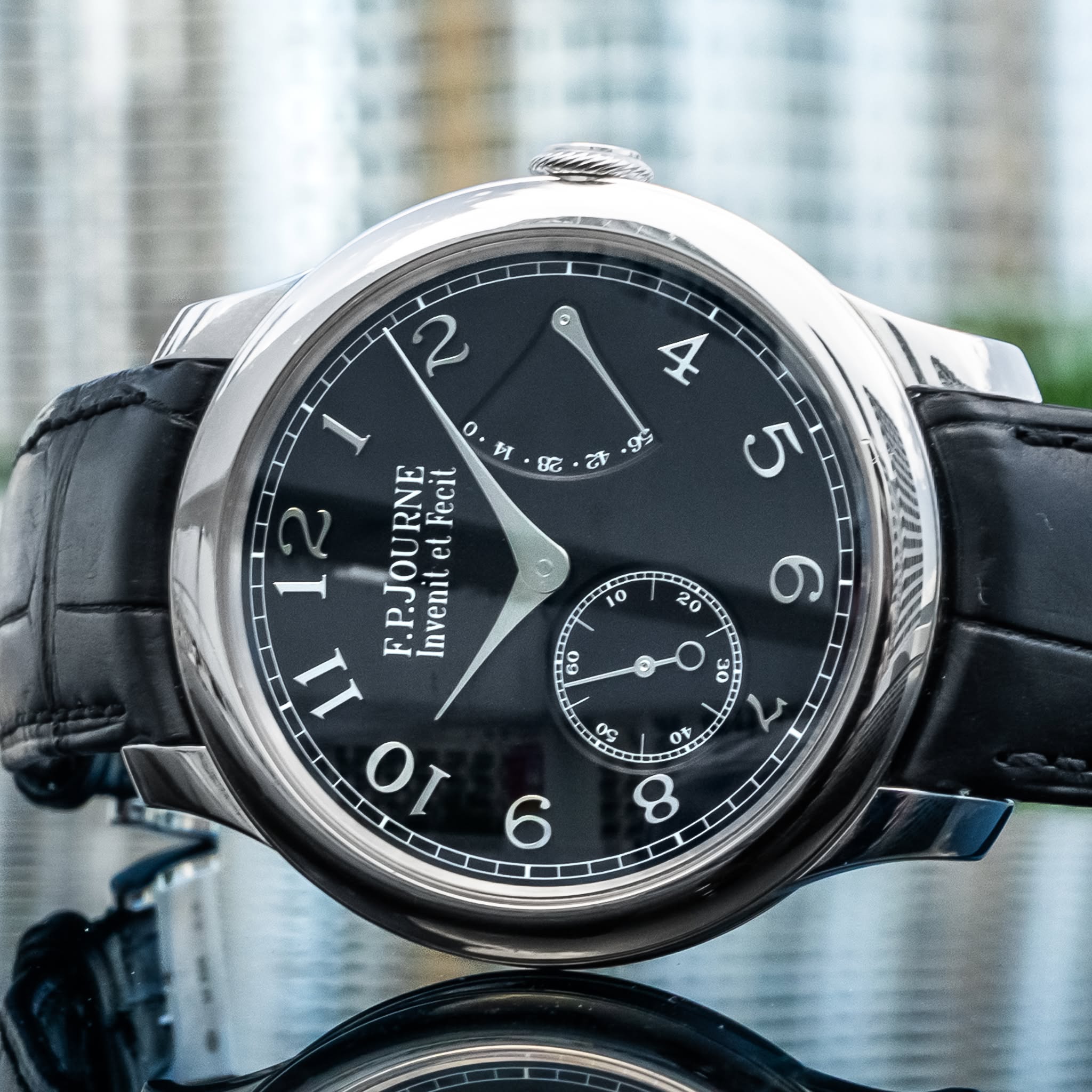 May be an image of wrist watch and text that says ' ٥ श 35 12 ا F.P.JOURNE eί Fecit Invenit O 30 O 9 شر B ま O'