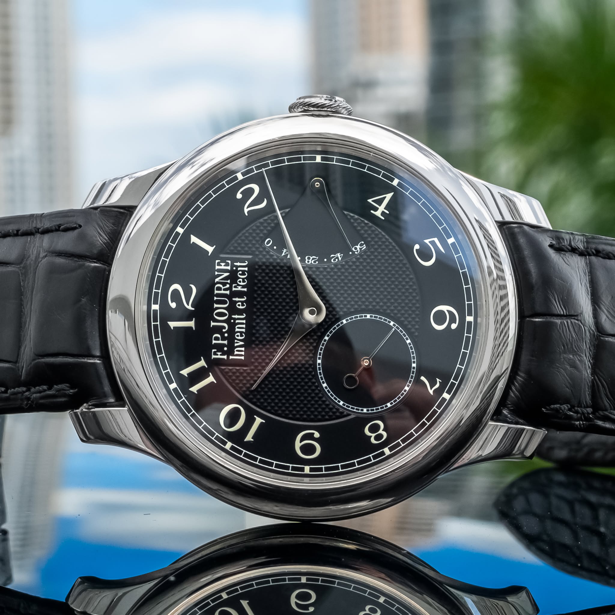 May be an image of ‎wrist watch and ‎text that says '‎٥ نمر 8G का 4 5 I 2 1 o Fecit 12 F.P.JOURNE et Invenit 11 10 တ 6 !٥ 7 ထ‎'‎‎