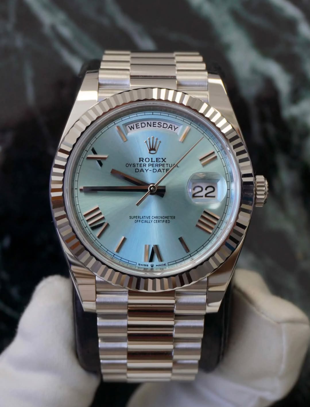 May be an image of wrist watch and text that says 'WEDNESDAY W ROLEX TER ERPERPETU DAY-DATE TERPERPETU DATF 22 UII III SUPERLTLEERONTE OFFI FFICIALLY CERTIFIED CERT SUPERLATIVI VE…