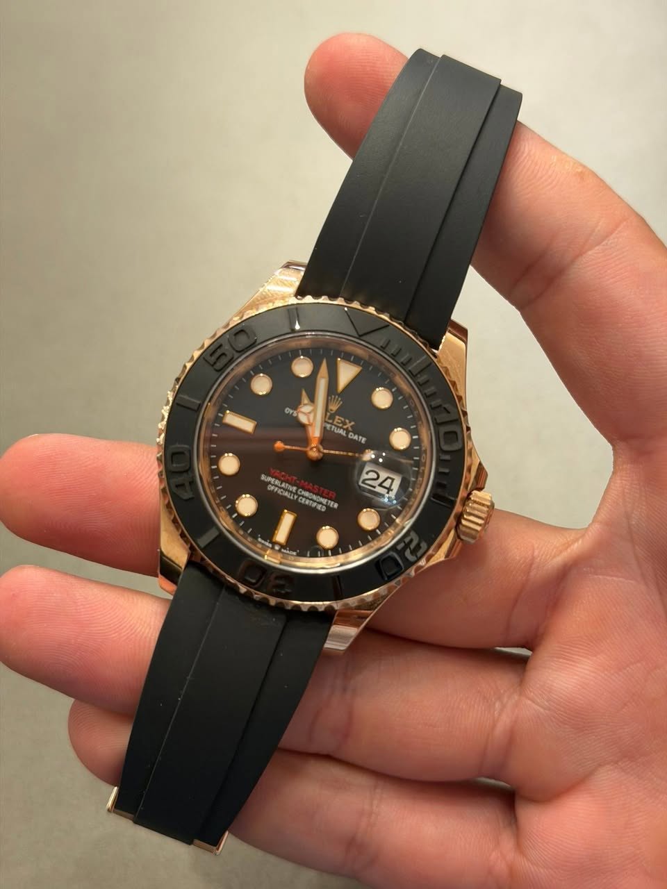 May be an image of wrist watch and text