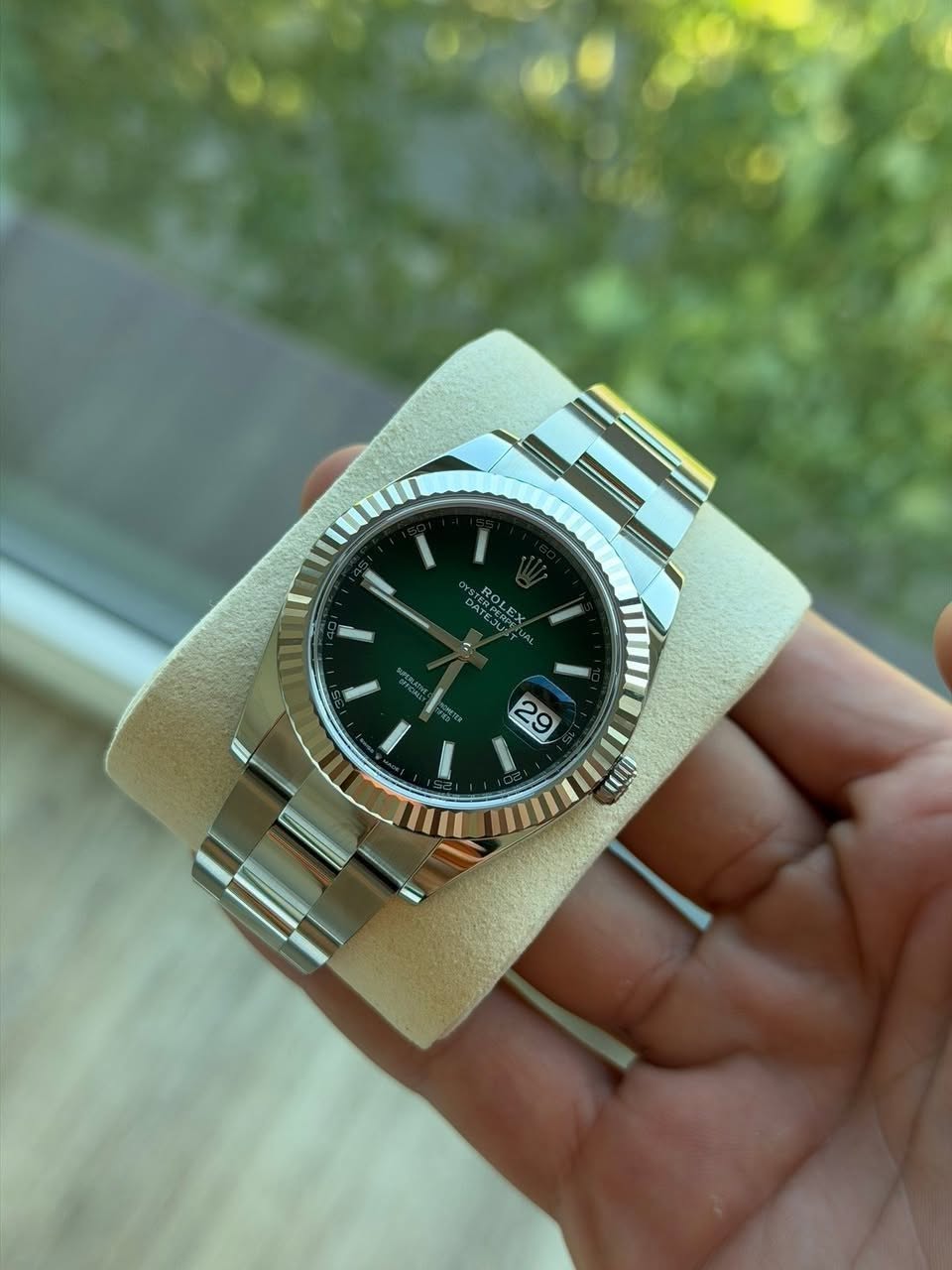 May be an image of digital watch and text that says 'ROLEX ل ROLE 29 ממעי'