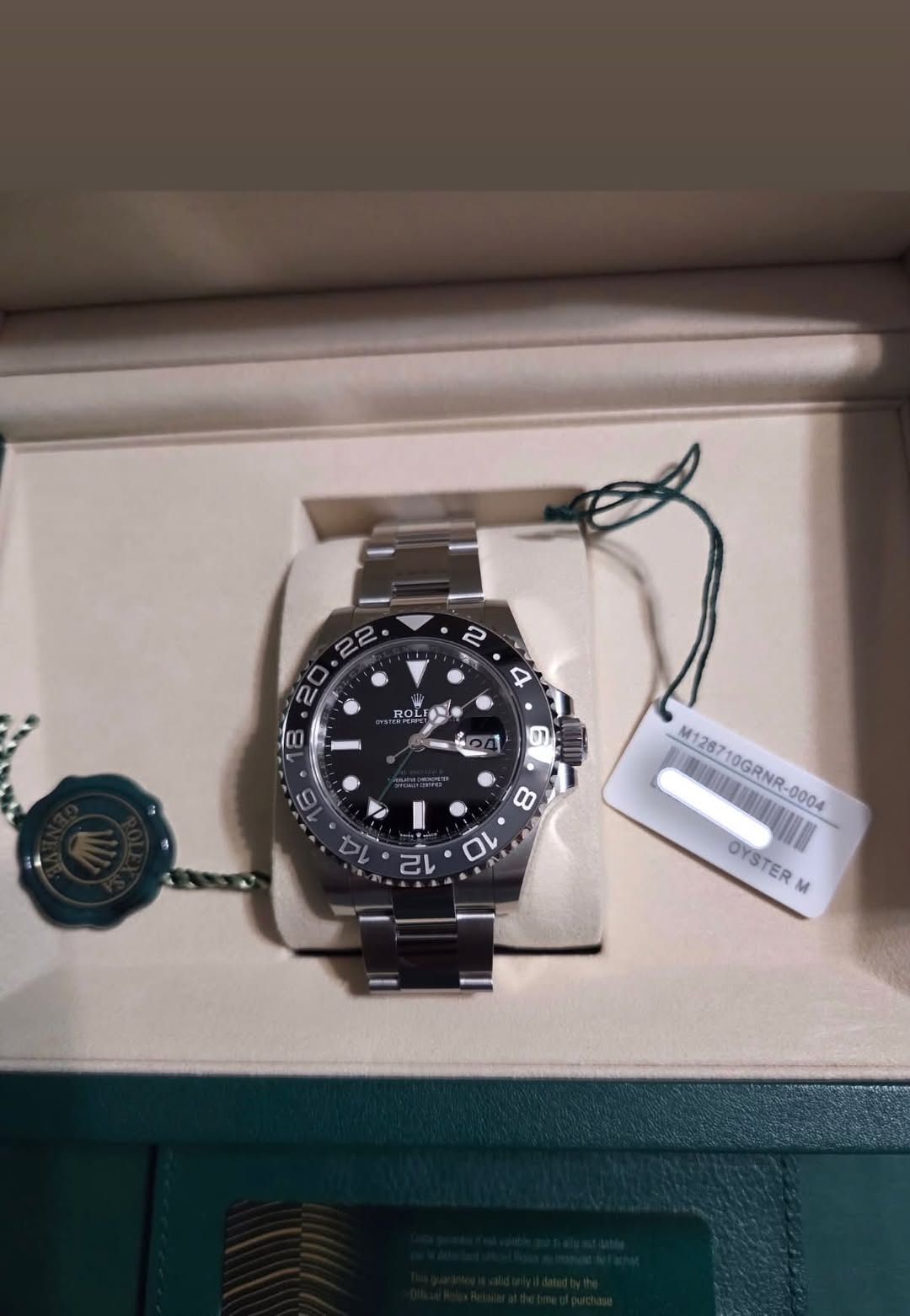 May be an image of wrist watch and text