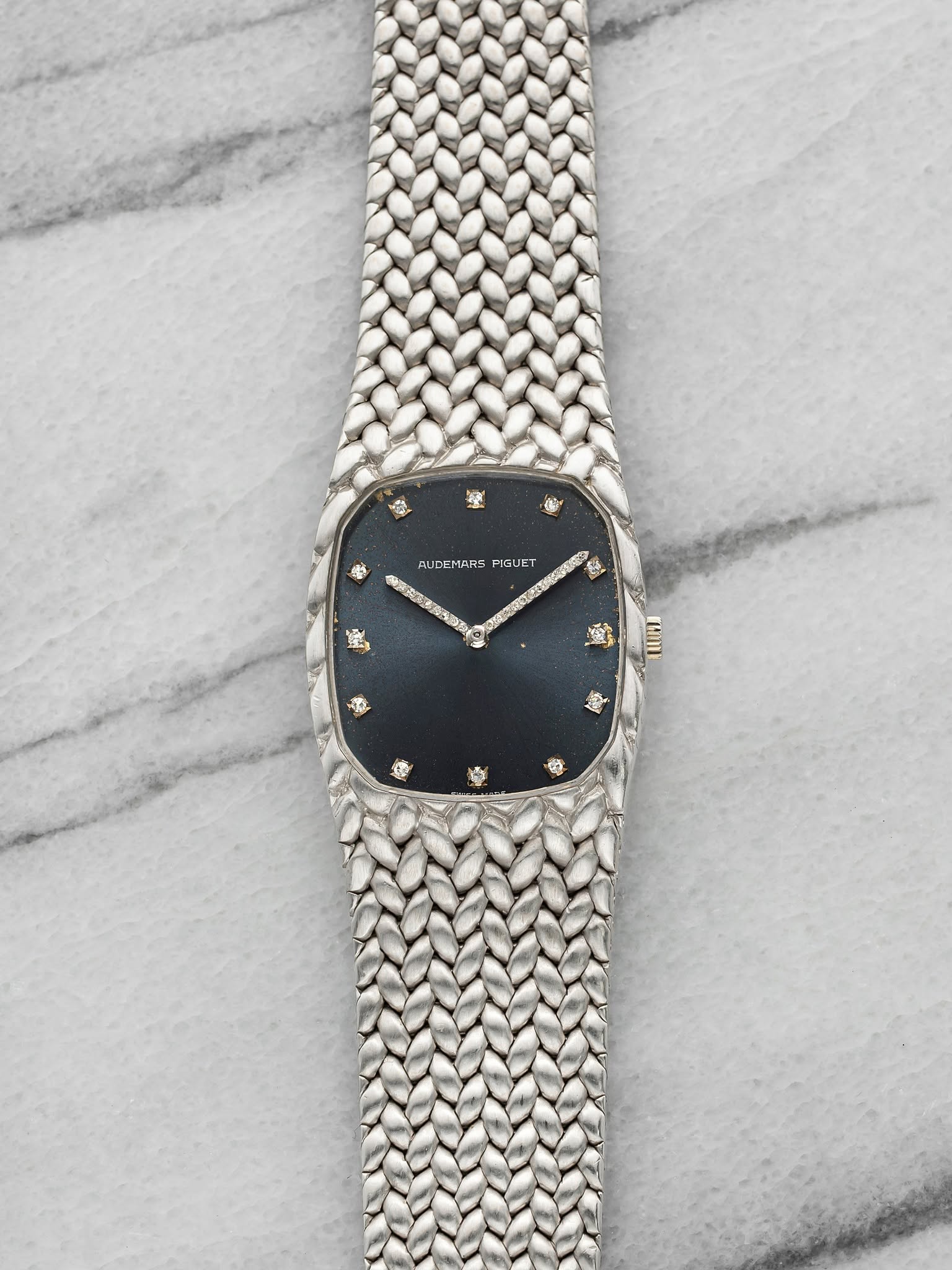 May be an image of wrist watch