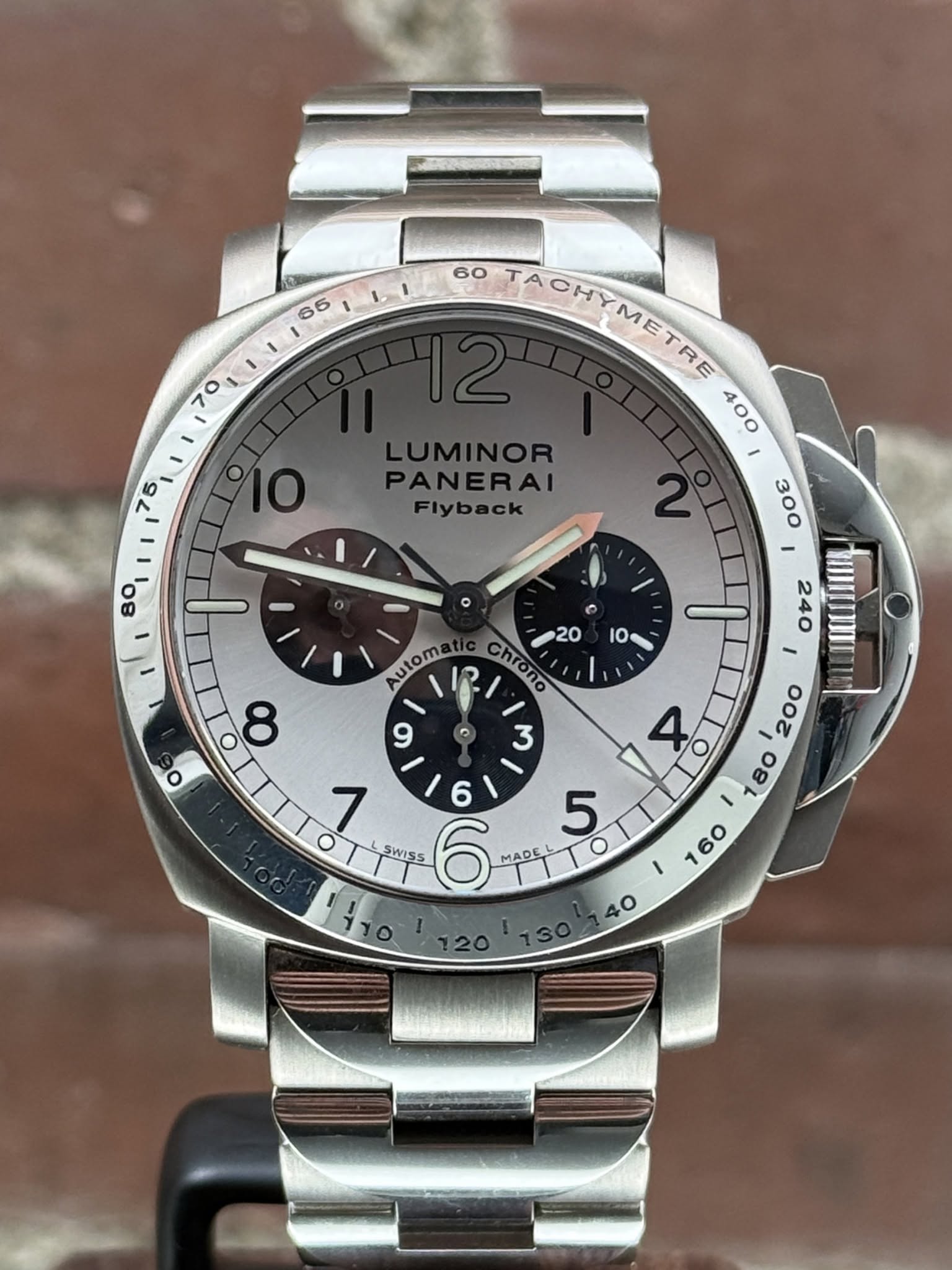May be an image of wrist watch and text that says '65 70 60 ΠϊΜΝΥΙΣ ACHYMETRE 400 LUMINOR PANERAI Flyback O 300 IO 8 Autom I2 Chrono 20 2 3 - O 9 o 6 240 ١ 200 80 O 7 SWISS / MADE…