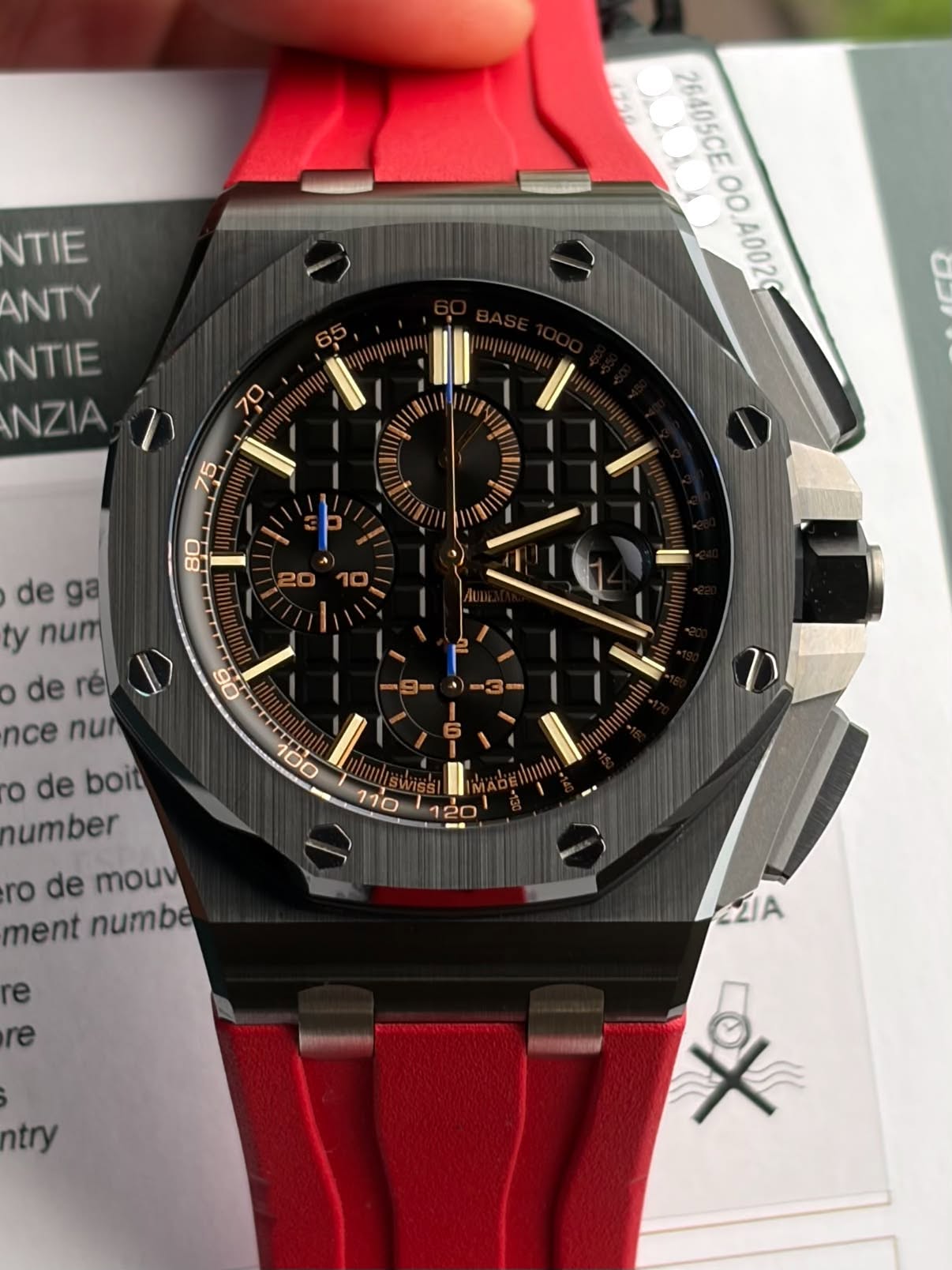 May be an image of wrist watch and text that says 'NTIE ANTY NTIE NZIA 26405CE 00 A002 de ga ty num de derel rél D 90 gmbo gC nce nu 100 o de boit 110 number ro de mouv ment numbe…