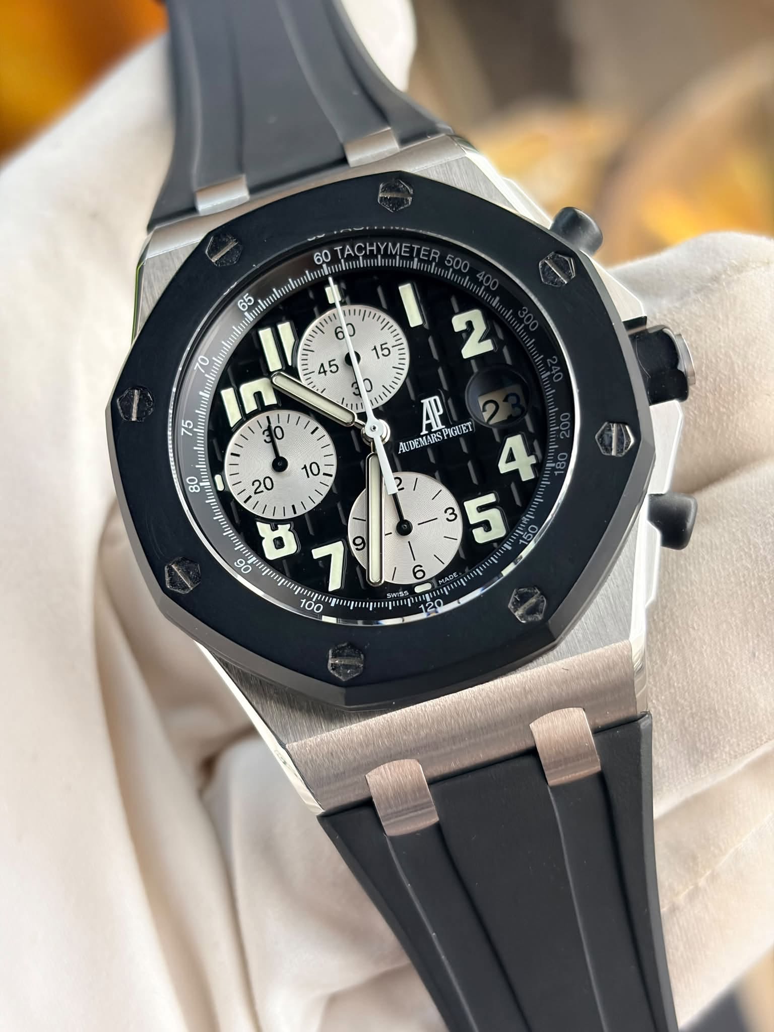 May be an image of wrist watch and text