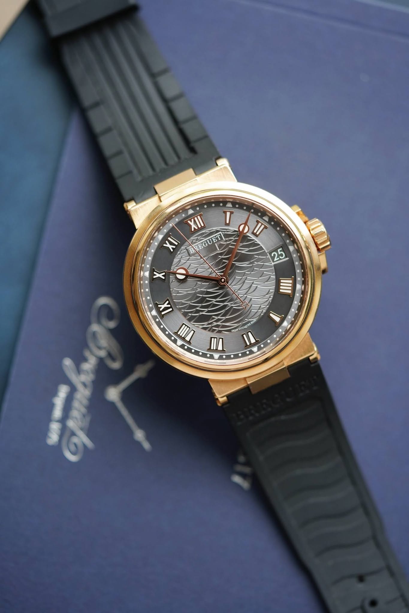 May be an image of wrist watch and text that says 'XII I χΙ 스랑~ REGUET TI 35 IIIII ١ IX !W II 1'