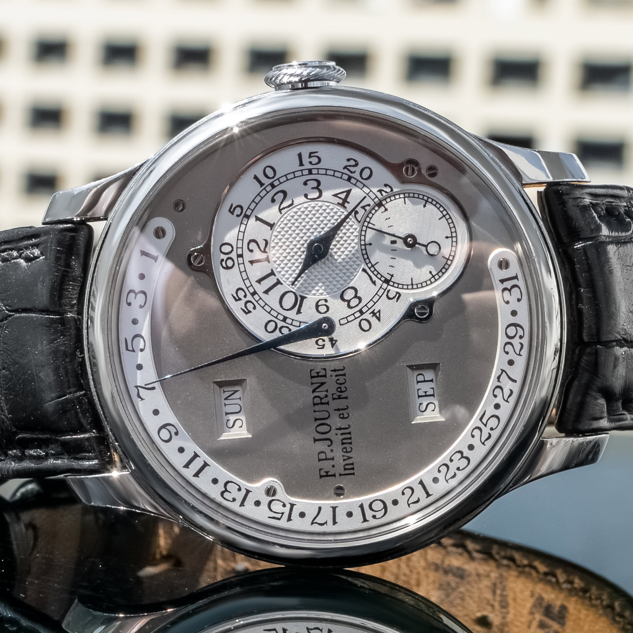 May be an image of wrist watch and text