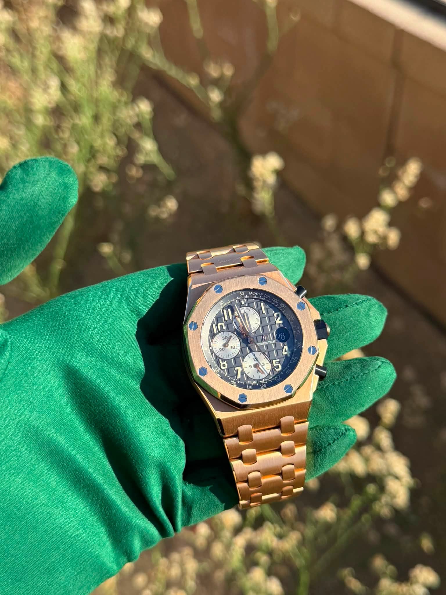 May be an image of wrist watch and text
