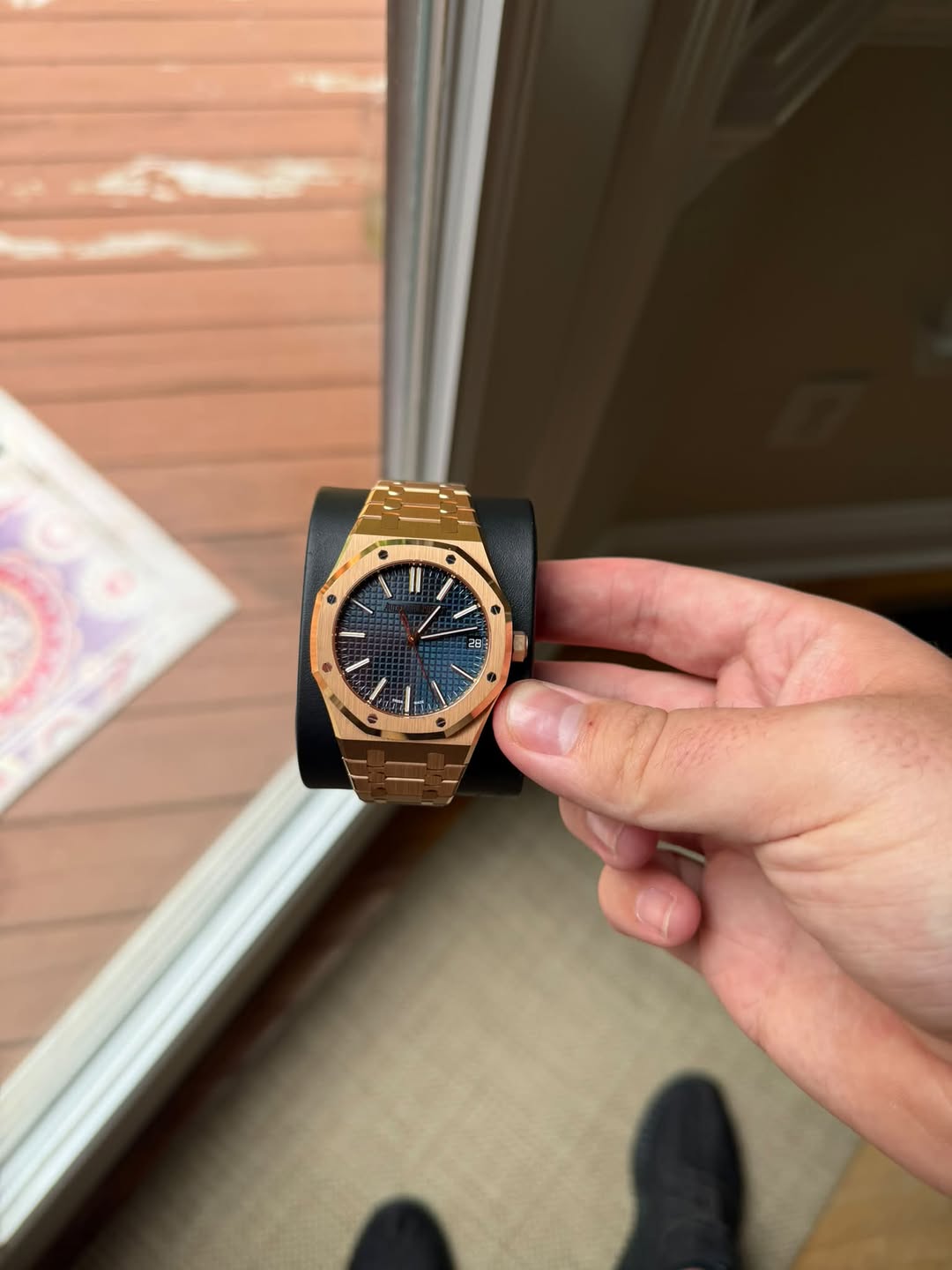May be an image of wrist watch and text