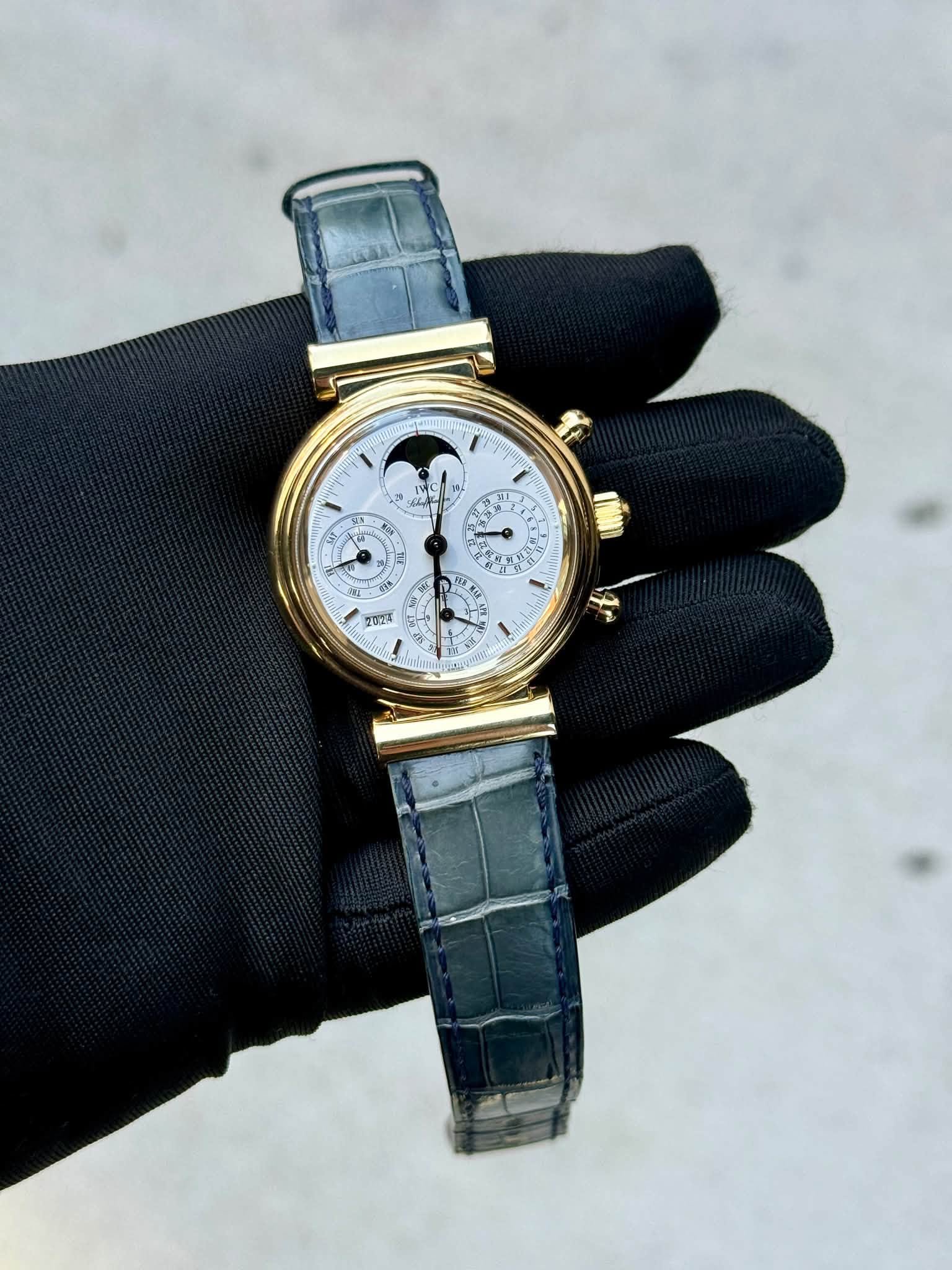 May be an image of wrist watch and text
