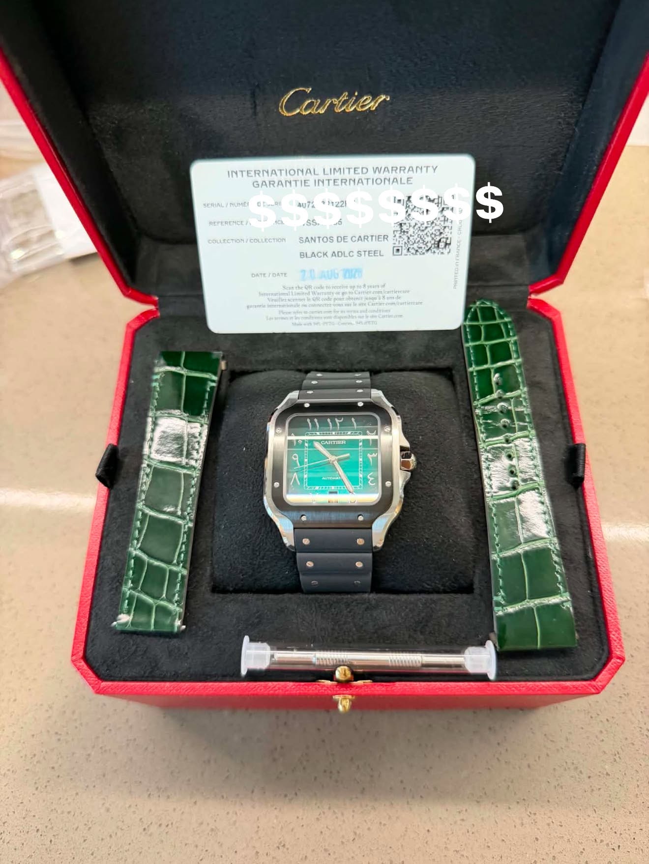 May be an image of digital watch and text that says 'Cartier SERINL TILME! ODmRi INTERNATIONALLIMITEDWARRAITY INTERNATIONAL LIMITED WARRANTY GARANTIENSTERFIATIONALE GARANTIE…