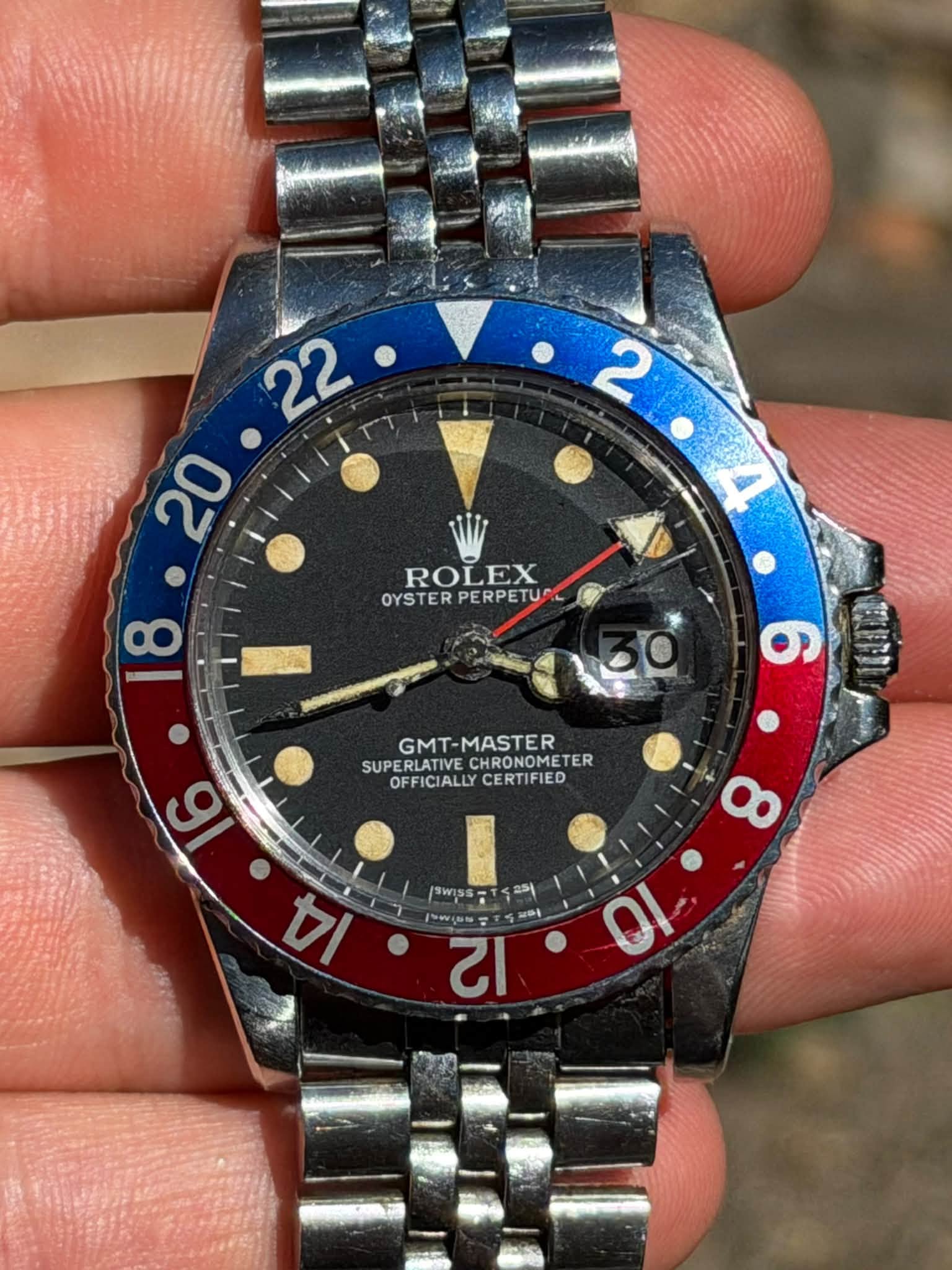 May be an image of text that says ' ROLEX OYSTER OYSTERPERPETUPL PERPETU GMT-MASTER GMT SUPERLATIVE SUPERLATIVECHRONOMETER SUPE CHRONOMETE TER OFFICIALLY OFFICIALLYCERTIFIED ALLY…