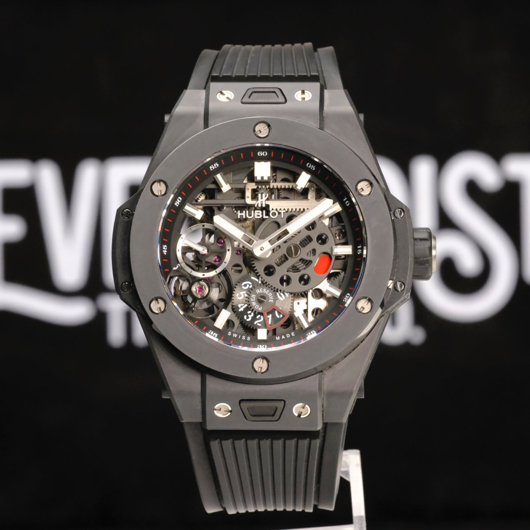 May be an image of wrist watch and text