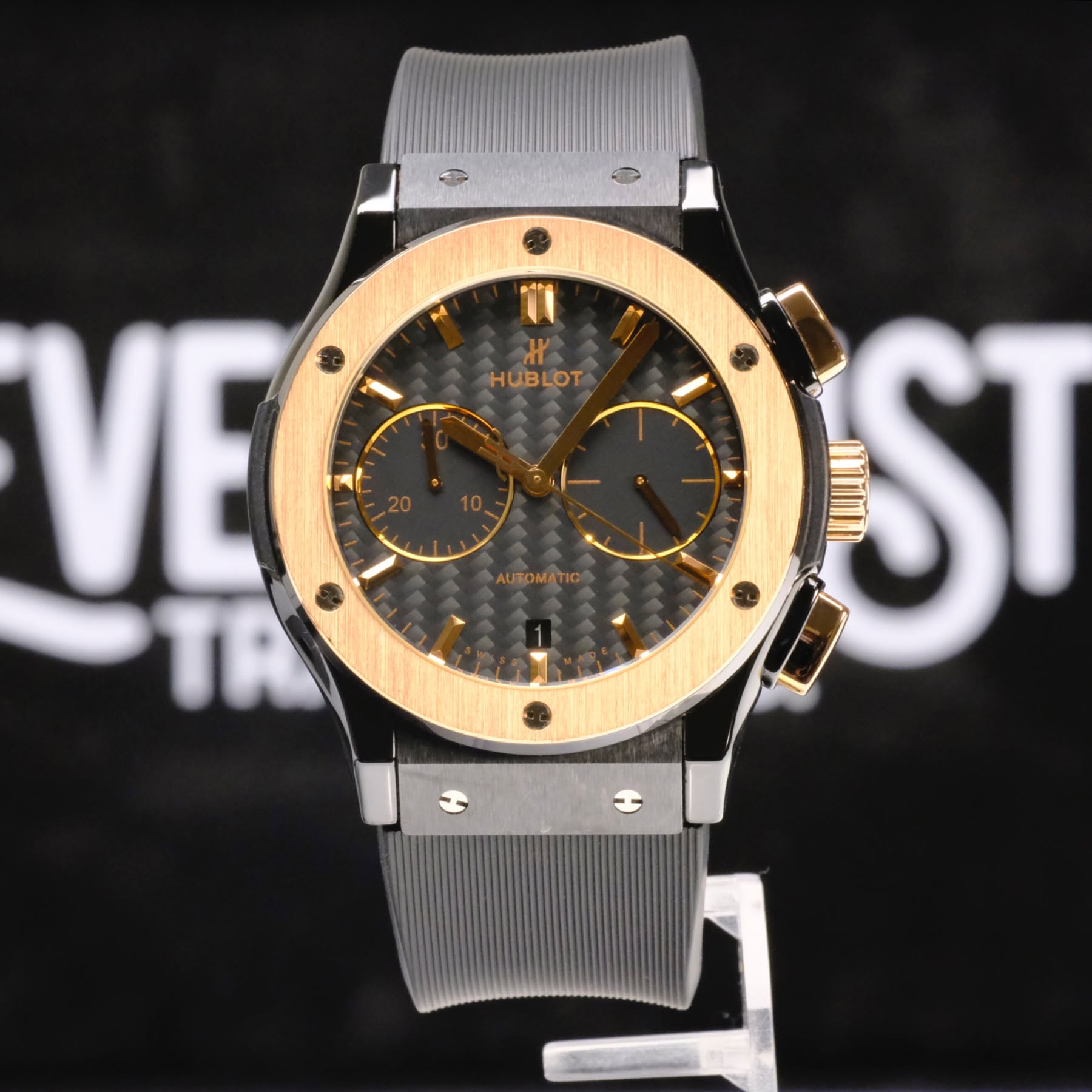 May be an image of wrist watch and text that says 'နှင် .味 UI ۱٢ HUBLOT AUTOMATIC VE 4 ST'