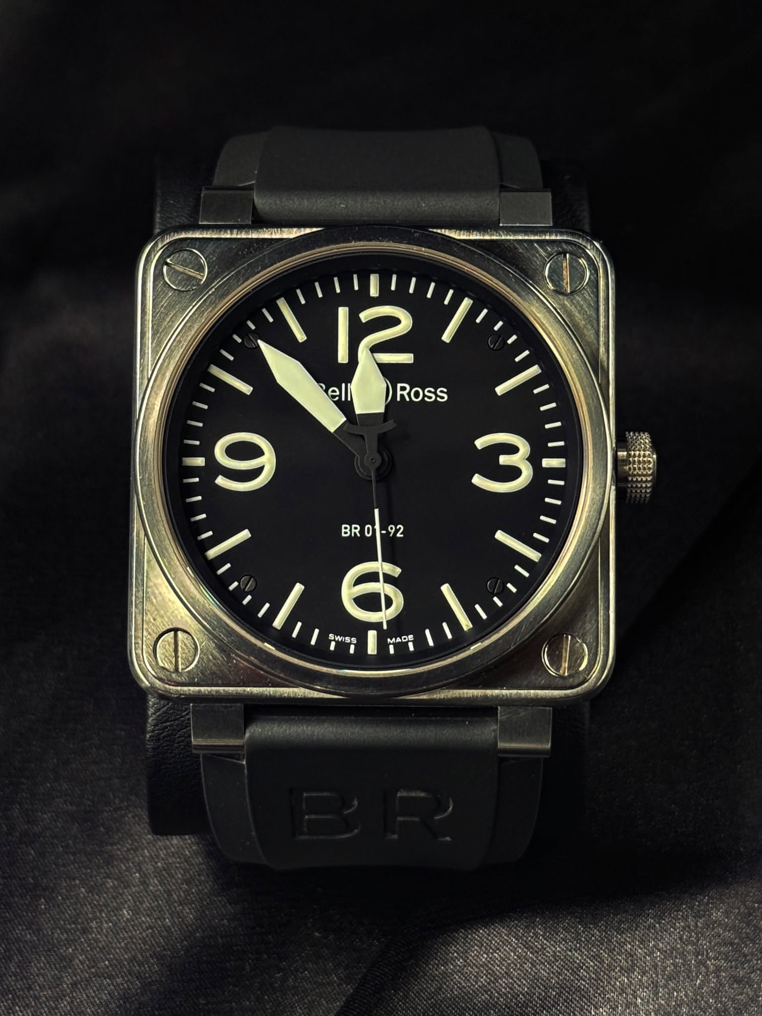 May be an image of digital watch and text that says '12 ell Ross Ross 3 9 BR BR01- BR01-92 -92 Wss SwIss MADE O'