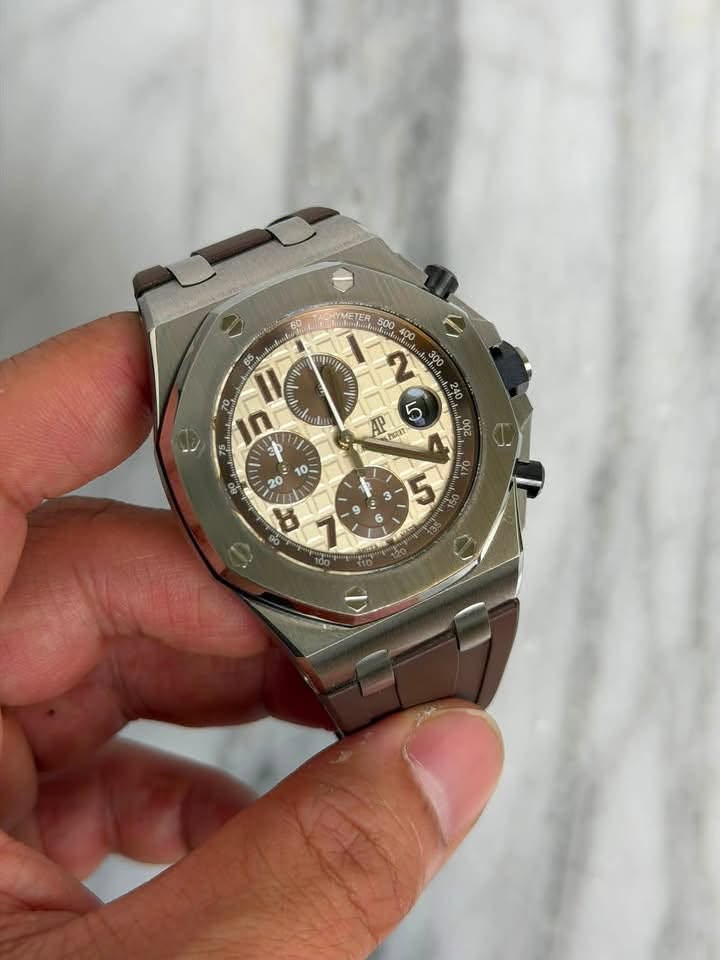 May be an image of wrist watch and text