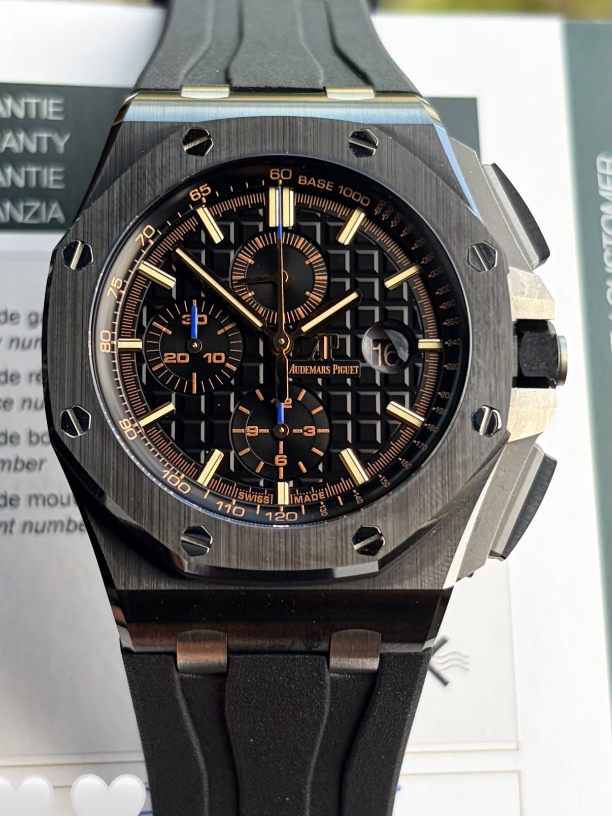 May be an image of wrist watch and text