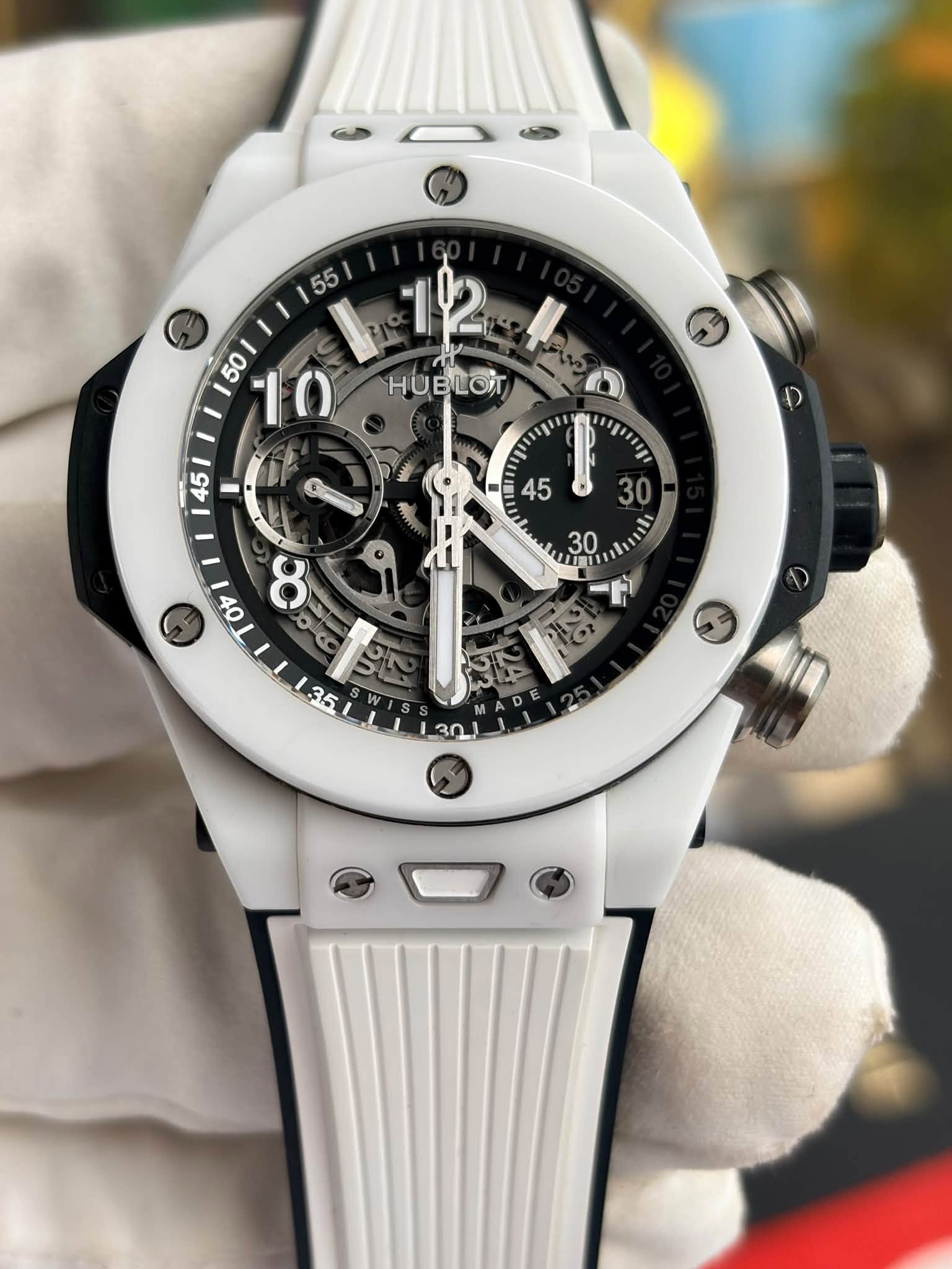 May be an image of wrist watch and text
