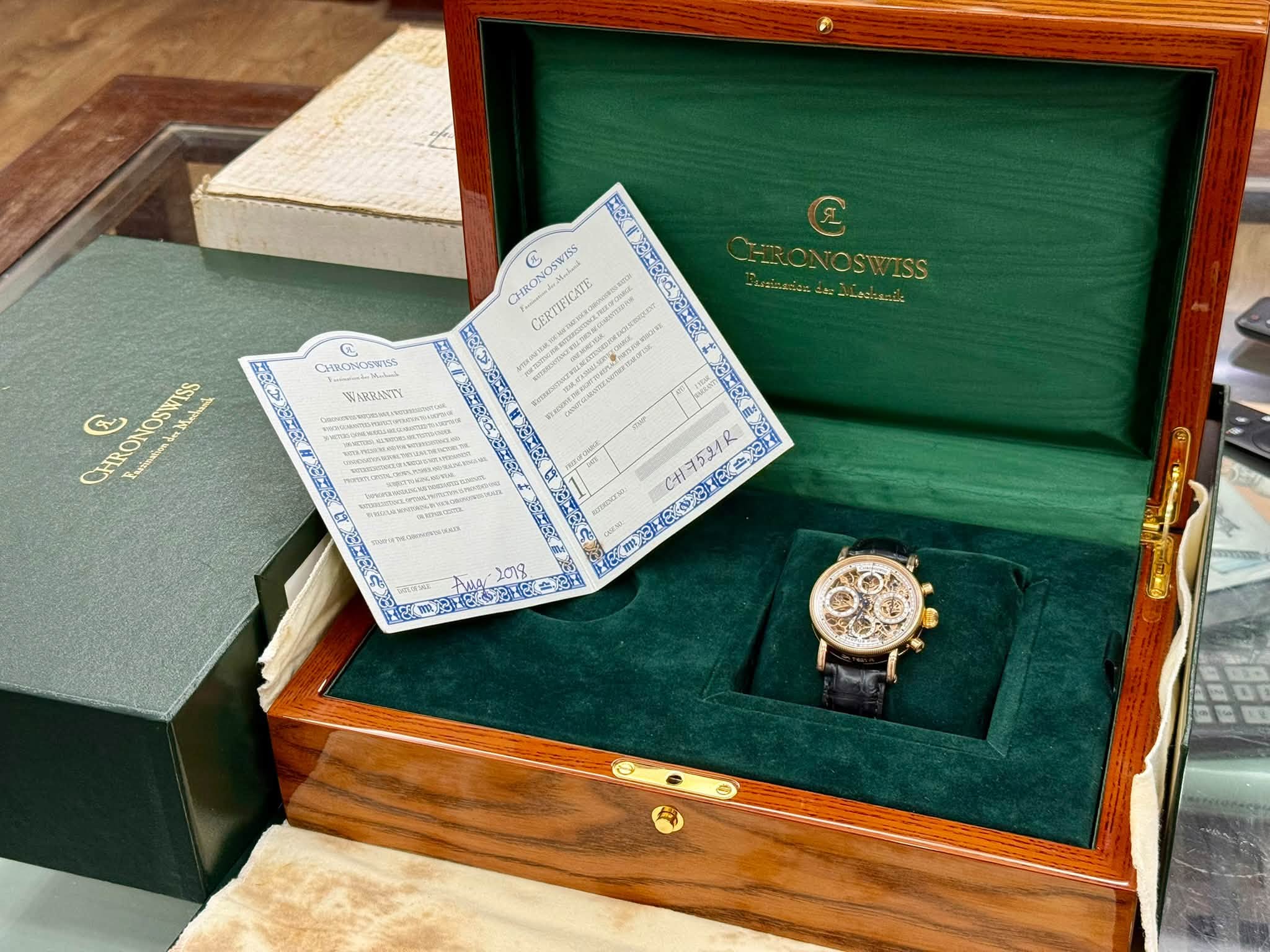 May be an image of wrist watch and text