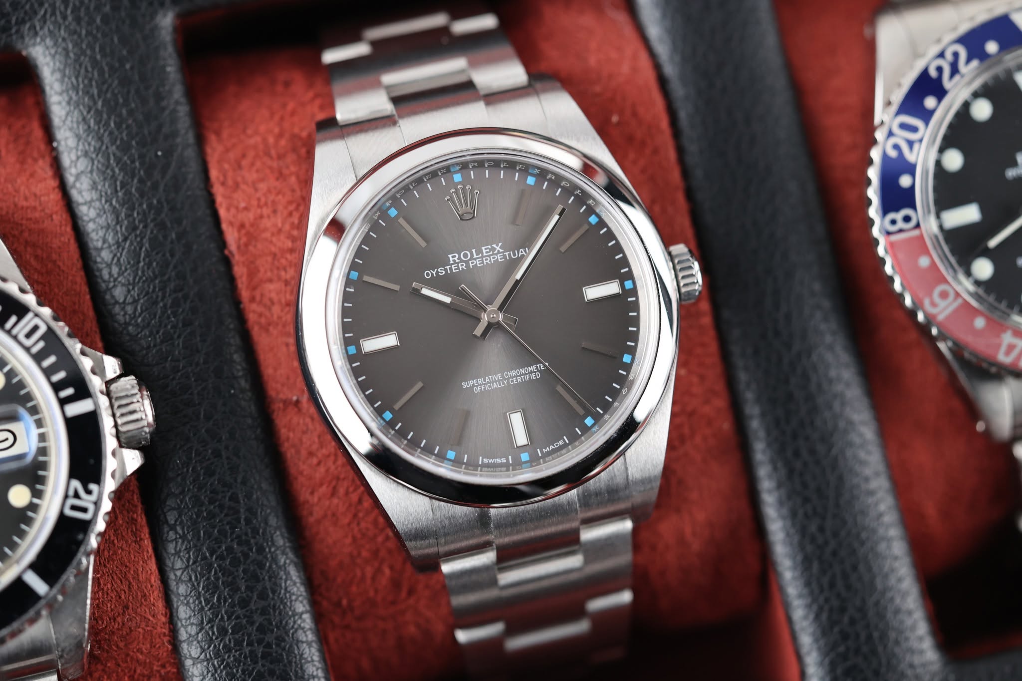 May be an image of wrist watch and text