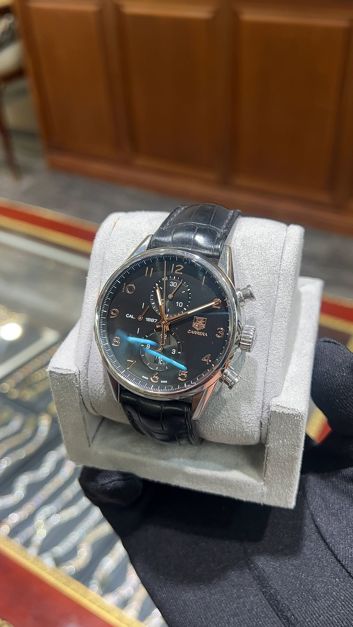 May be an image of wrist watch and text