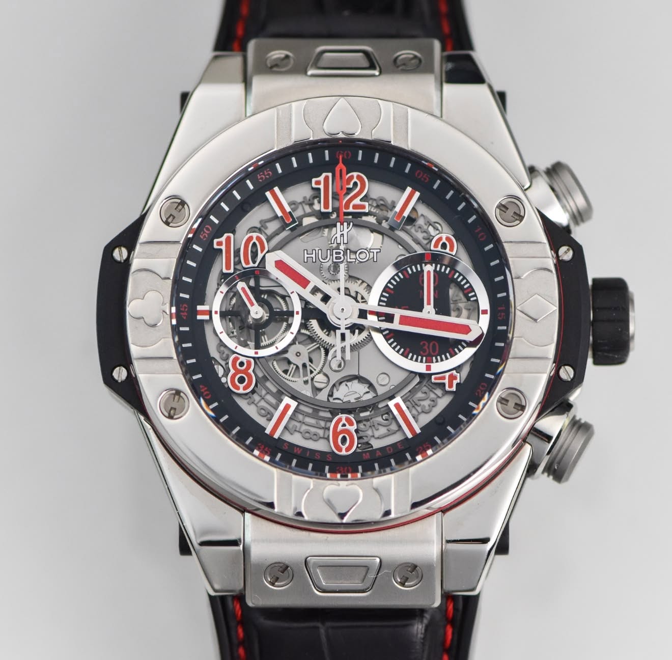 May be an image of wrist watch and text