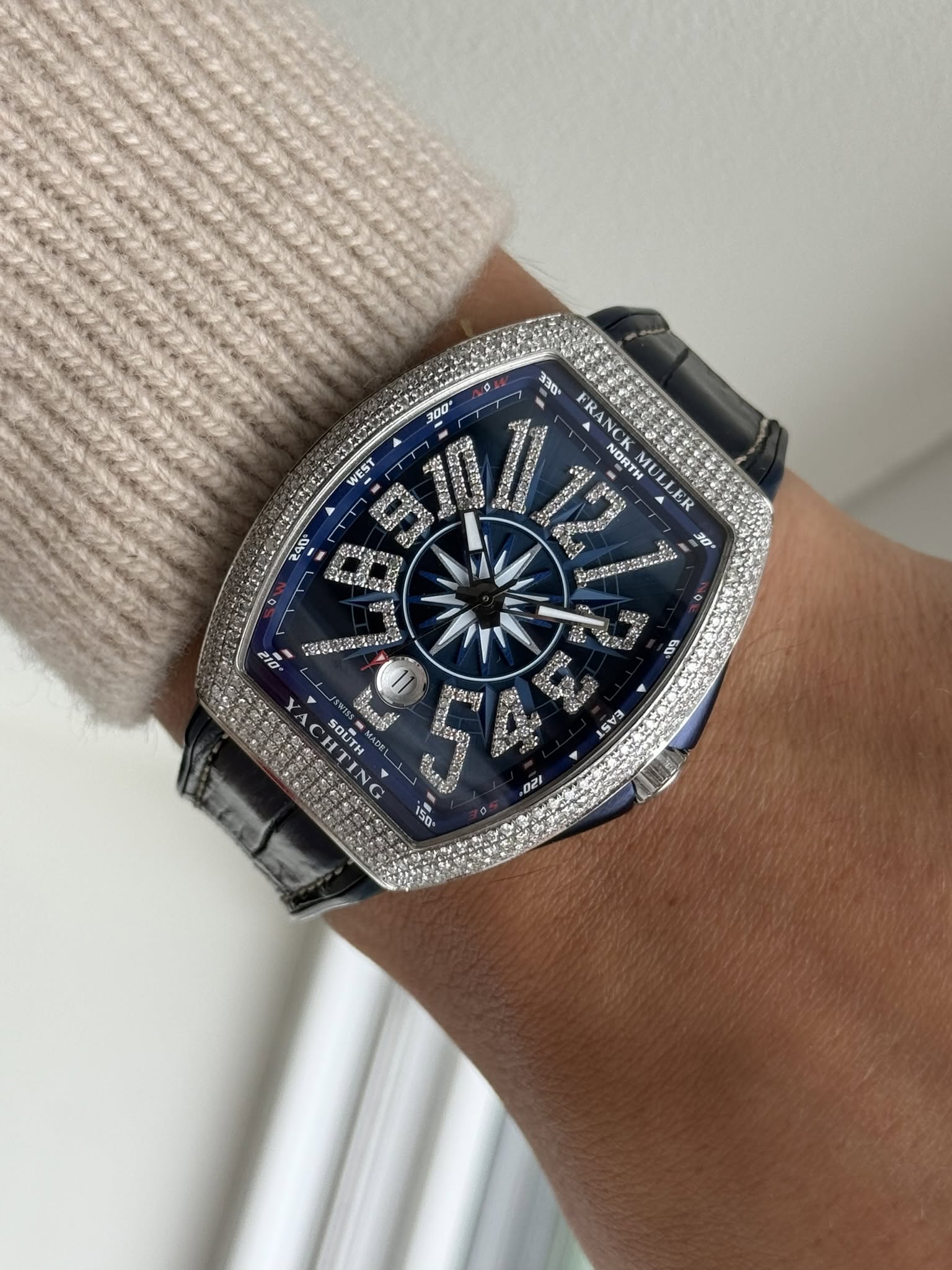 May be an image of wrist watch and text
